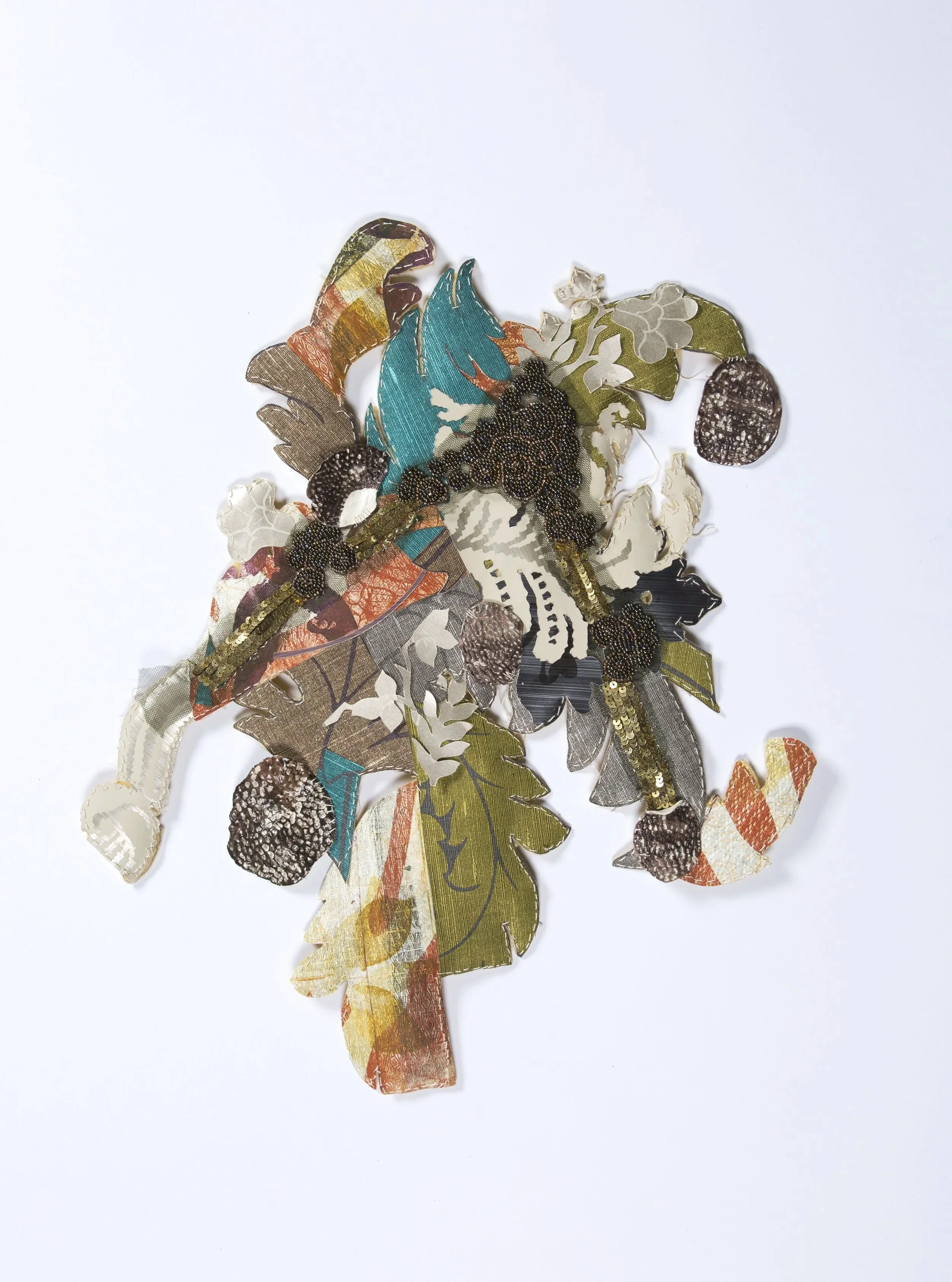 Piecing Together 4, (2018)
collage repurposed wallpaper remnants, repurposed beaded trim, threads, paperclay, etching and repurposed foam
50.5 x 42.5 cm (variable) 
