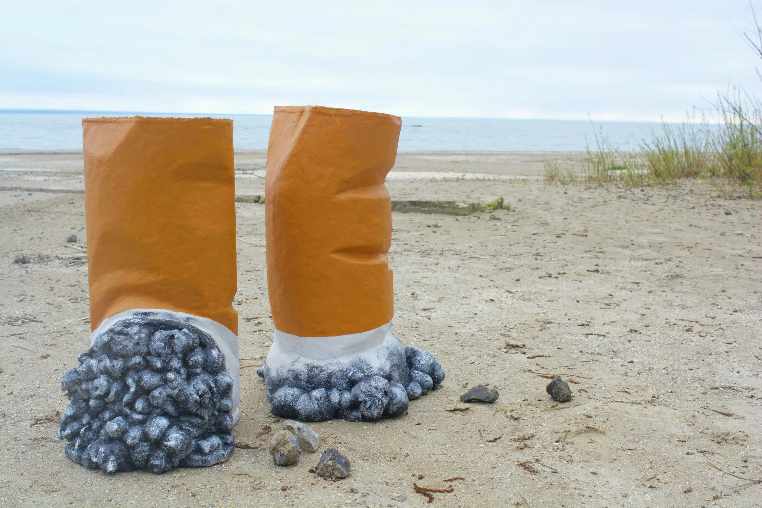 Big Cigs – oversized sculptural cigarette butt stools by Indigenous artist Ashley J MacDonald, playful statement furniture