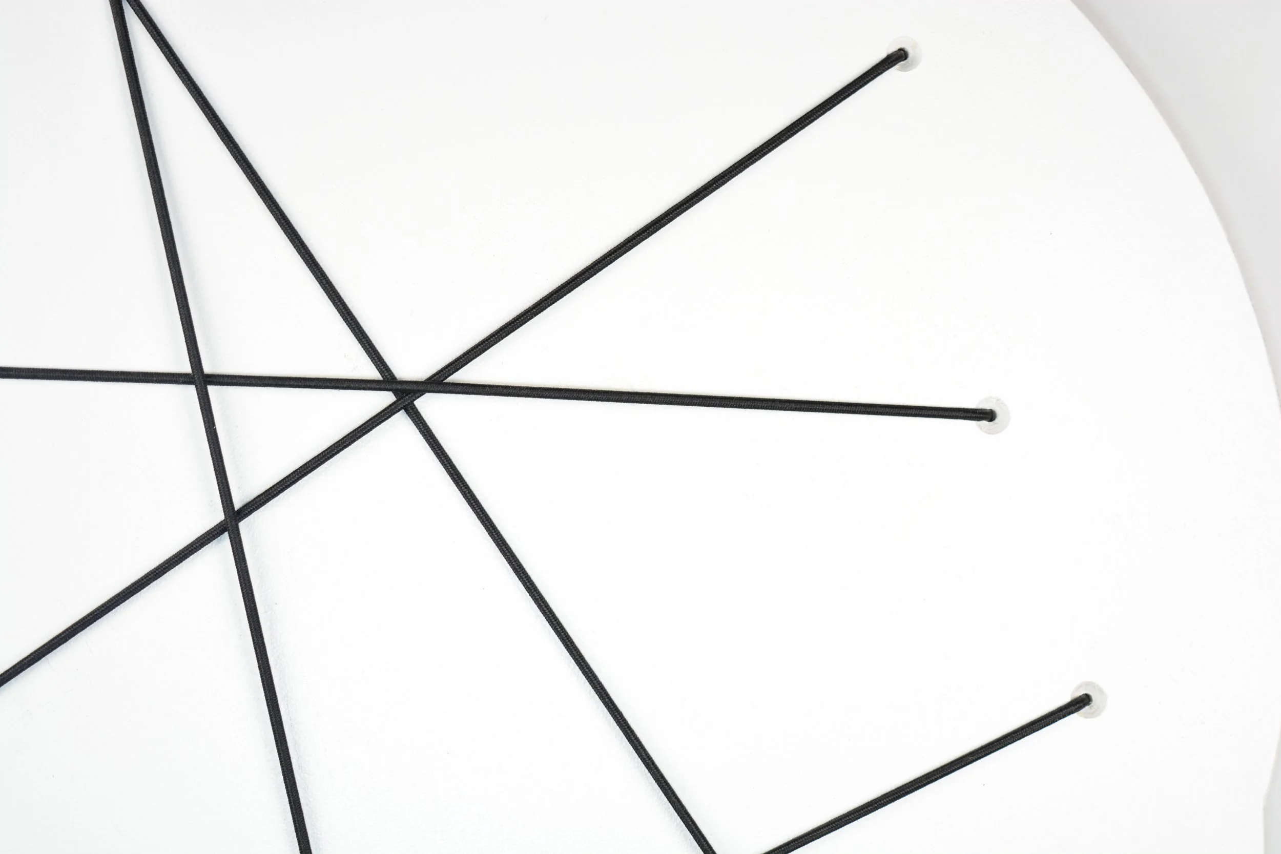 Detail of Word Bubble, Birch strung with elastic cording, by Ashley J MacDonald