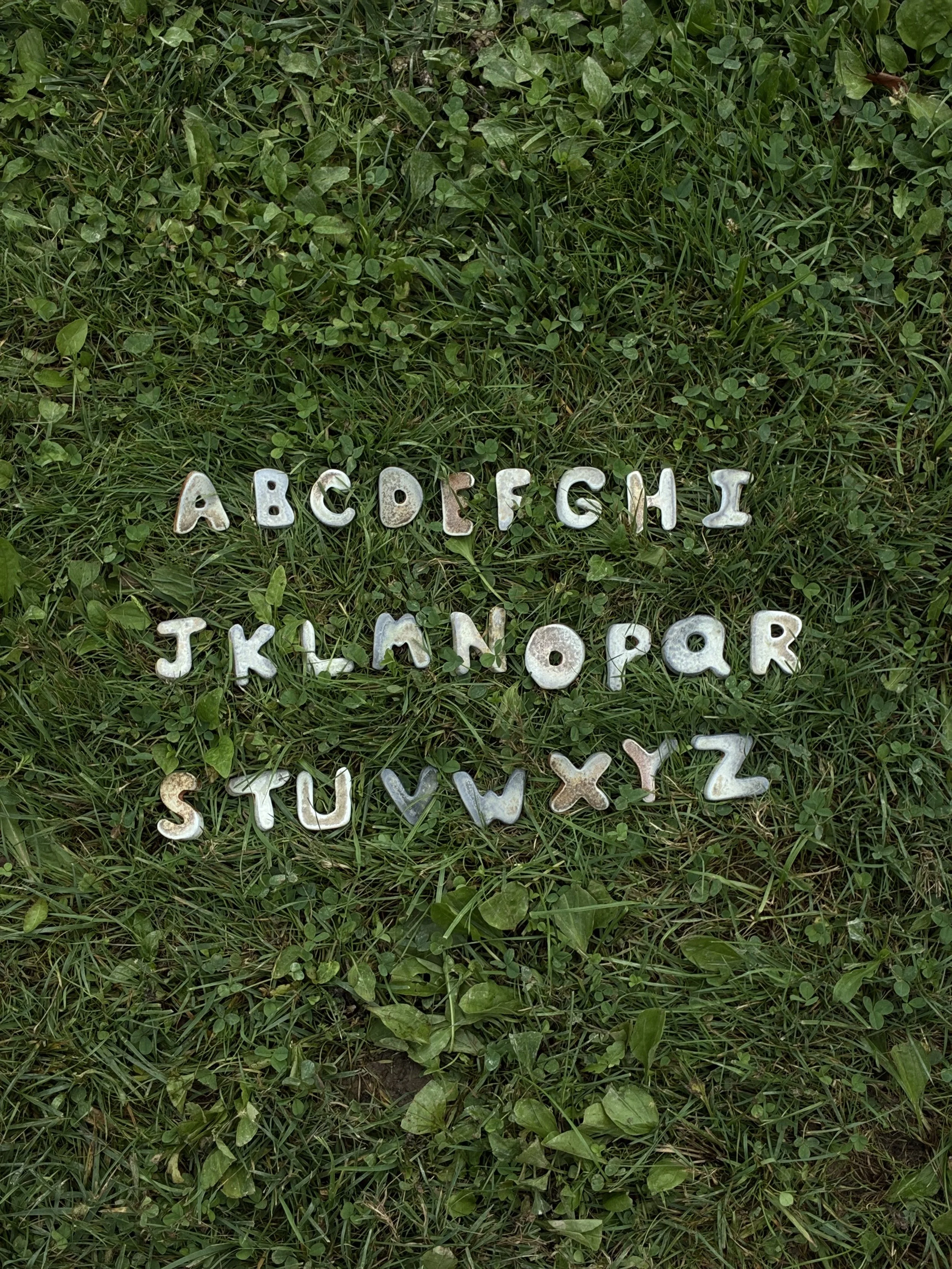 Alphabet soup refrigerator magnets, wood-fired