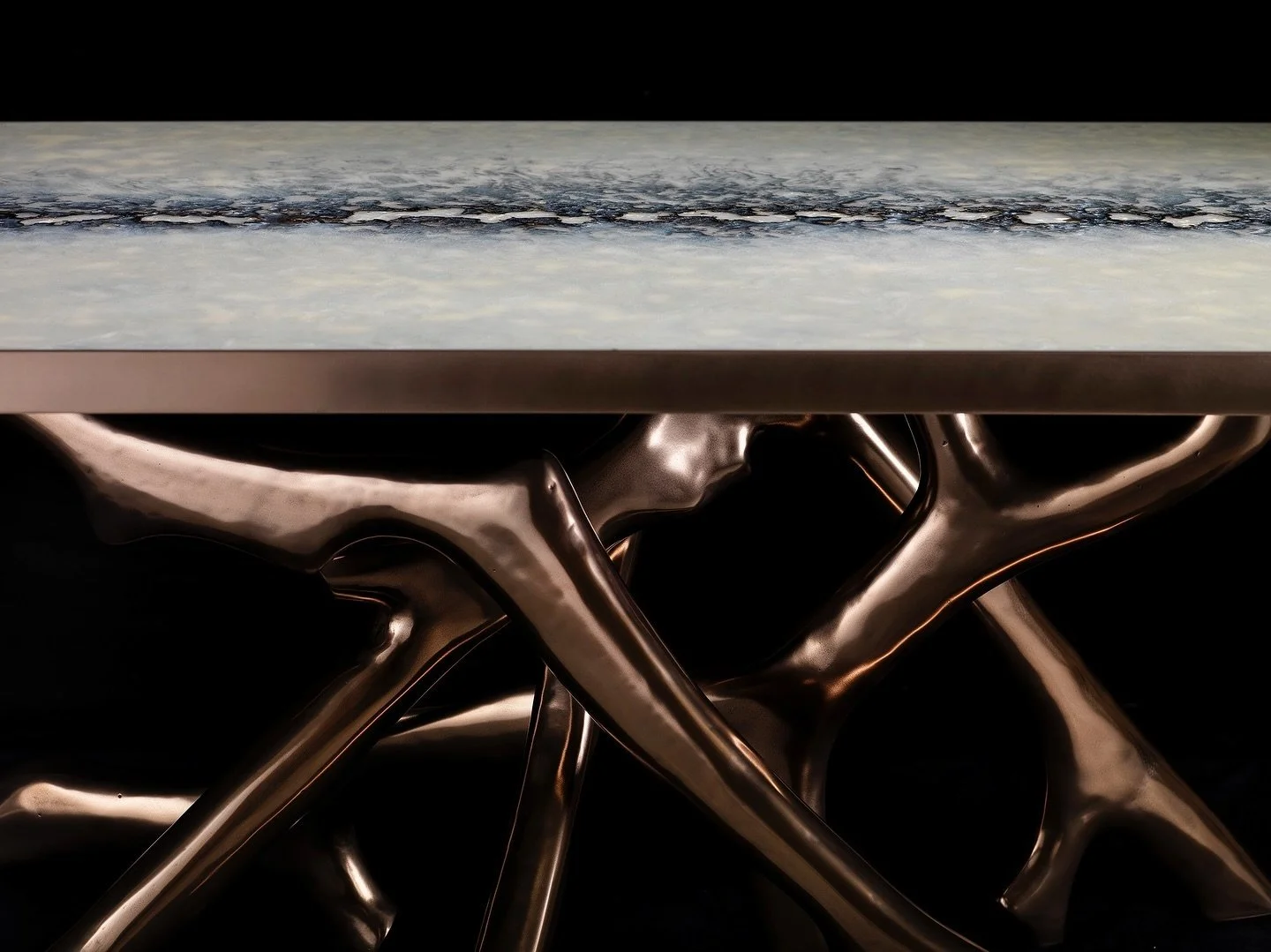 The Treow Table.

The sculptural bronze base is a key feature to this piece. Each leg was sketched and hand carved to an organic yet defined unique form. Working with a local foundry we then sand casted each leg to give them the weight and strength r