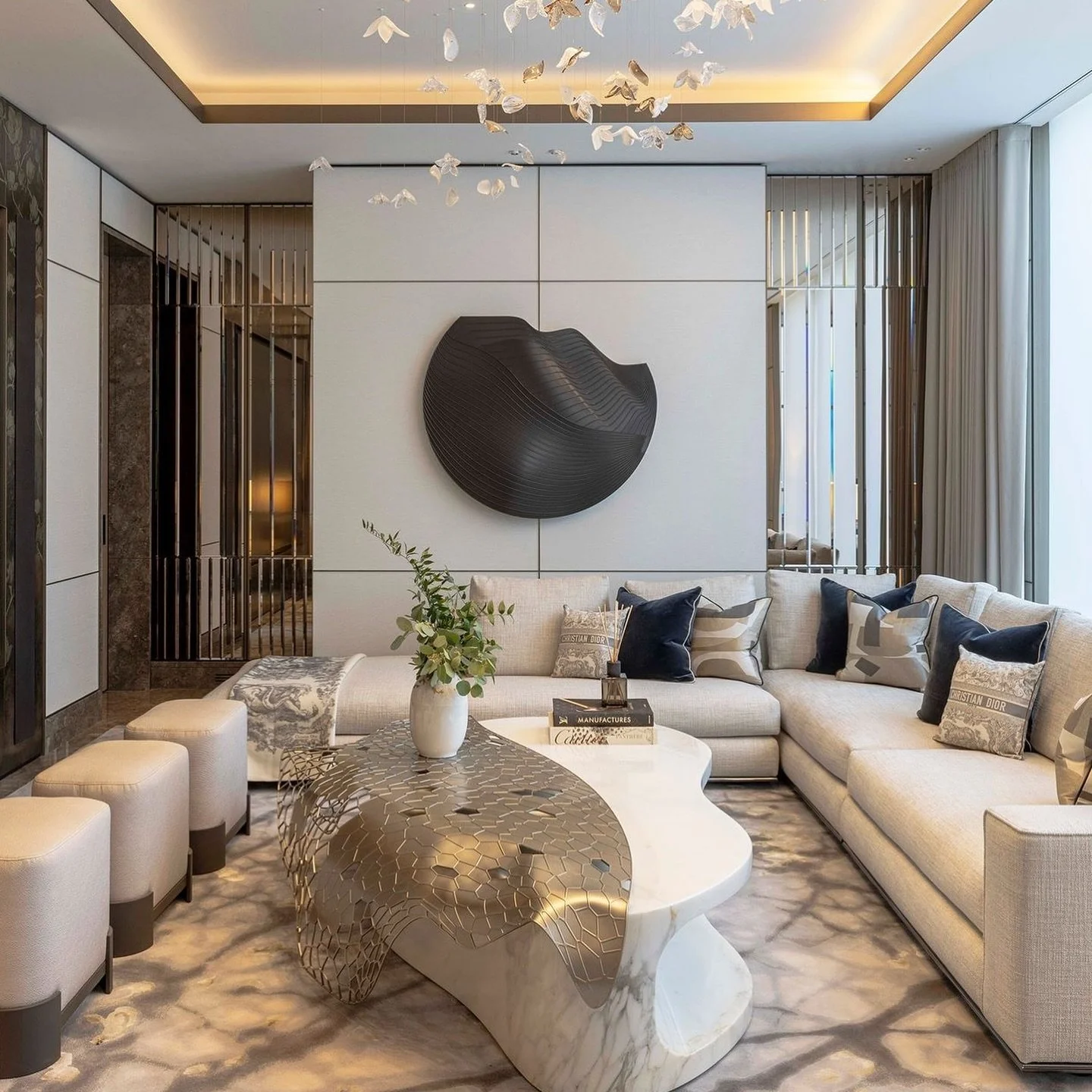 Wall Sculpture.

A bespoke wall sculpture comprises of varying undulating forms and layers reflecting the light to create shadows and movement within the dark bronze finish.

Made by Anka.
Designed by Rigby &amp; Rigby. 

@rigbyandrigby