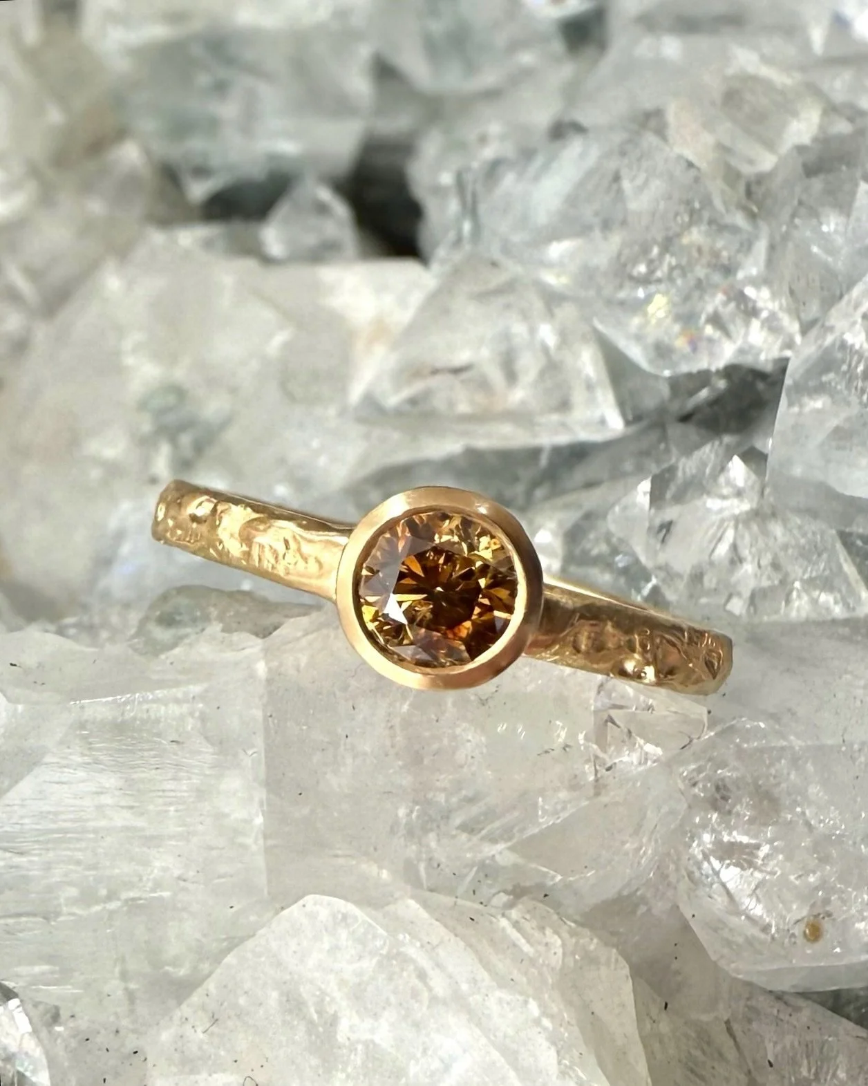 The Nelides ring with the most stunning orange-brown cognac diamond that feels like a warm spiced tea, a deep and complex winter poem, and an expression of nature&rsquo;s magic brought to life through the rich minerals of the earth. 

Just delivered 