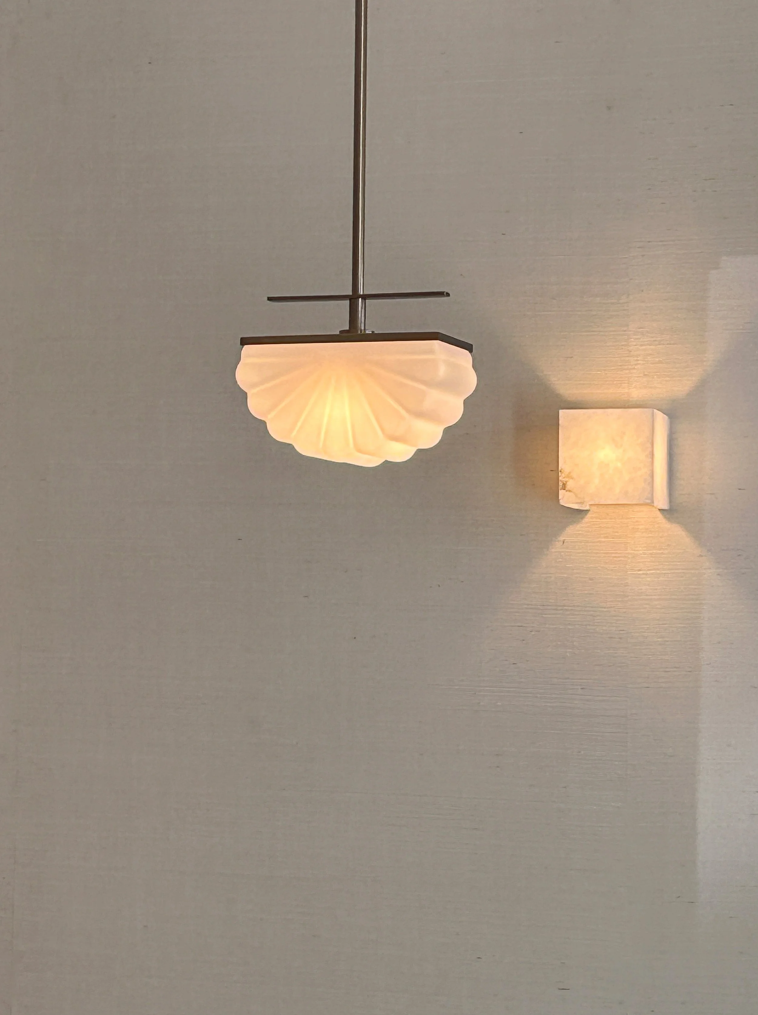 Pendant lights installed during our interior design studio renovation