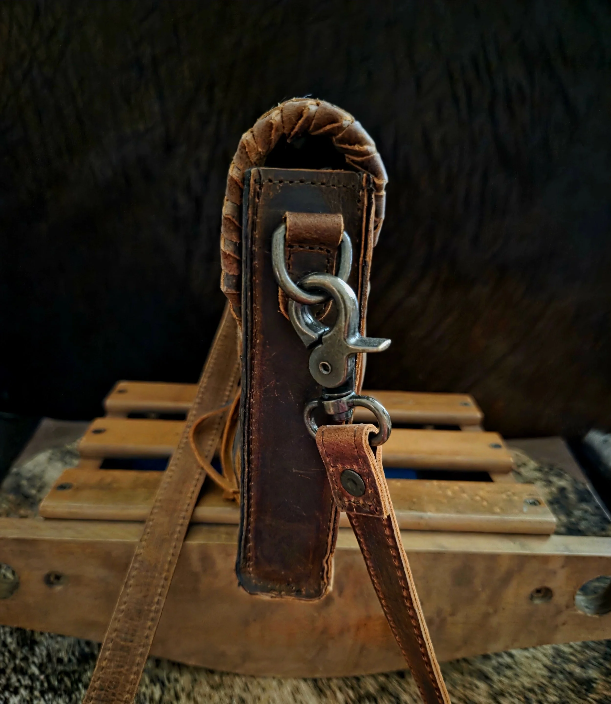 Side profile of leather cross body bag