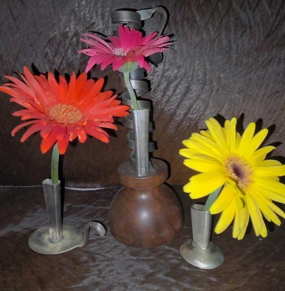 Miniature silverware vase
