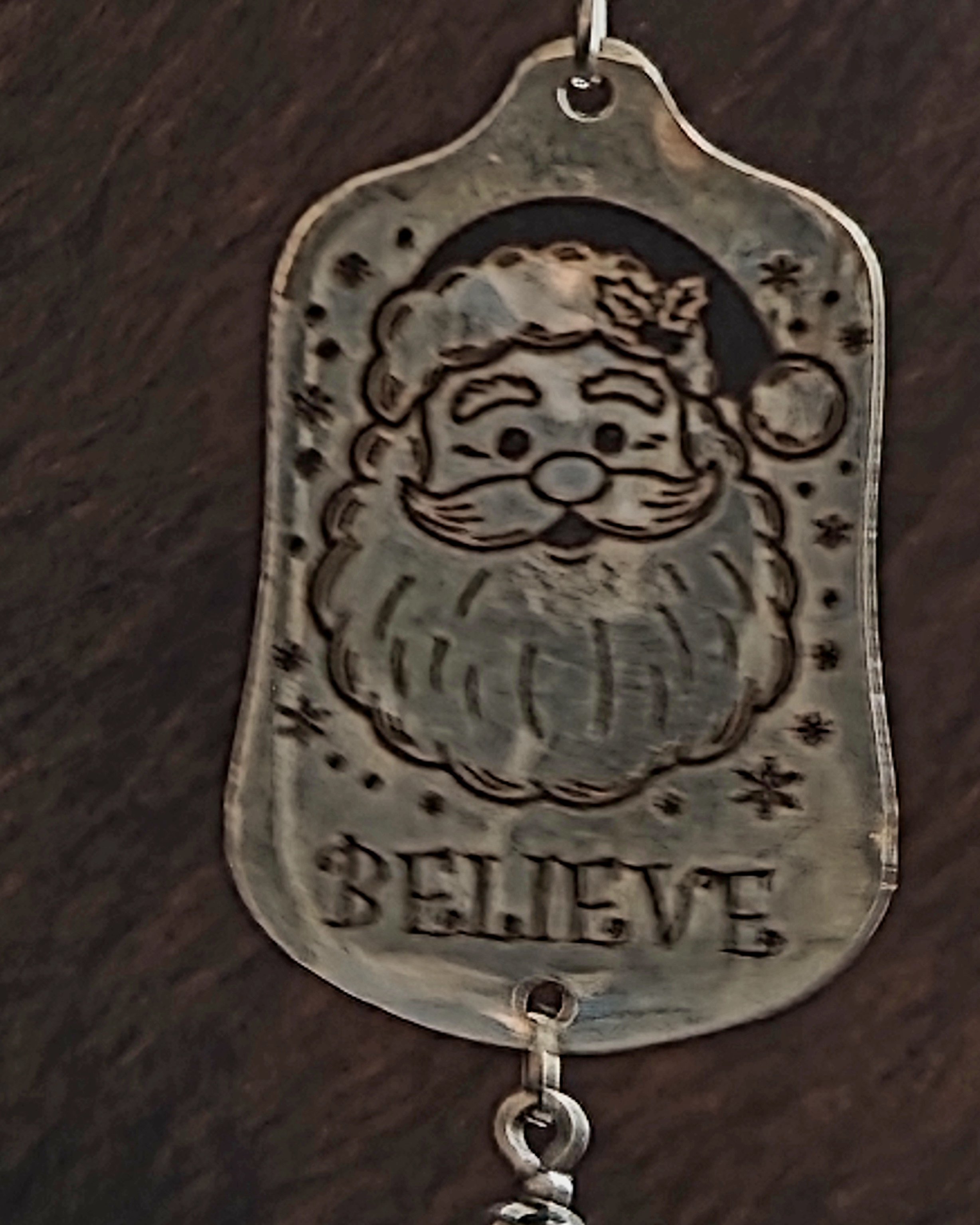 Bell - Closeup Believe Santa silwerware ornament.jpg