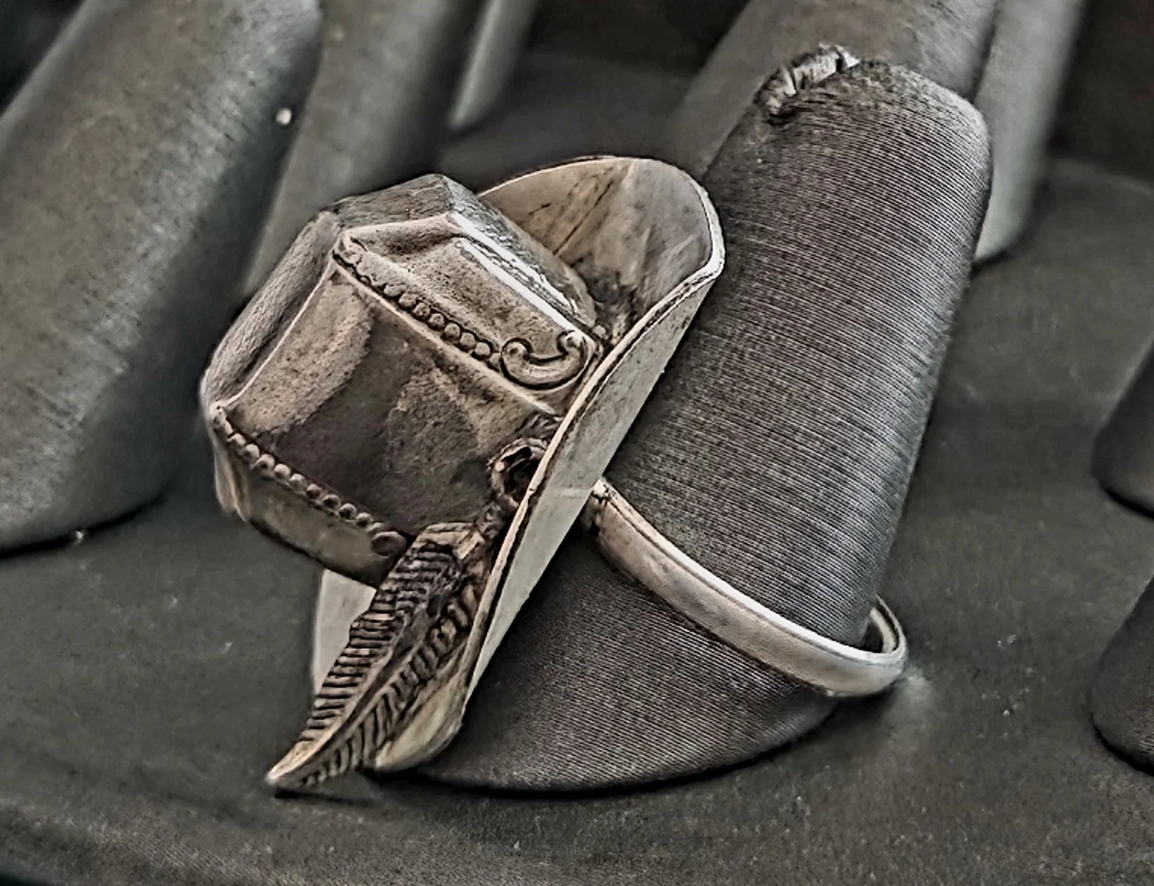 Handcrafted Cowboy Hat Ring with Feather Accent