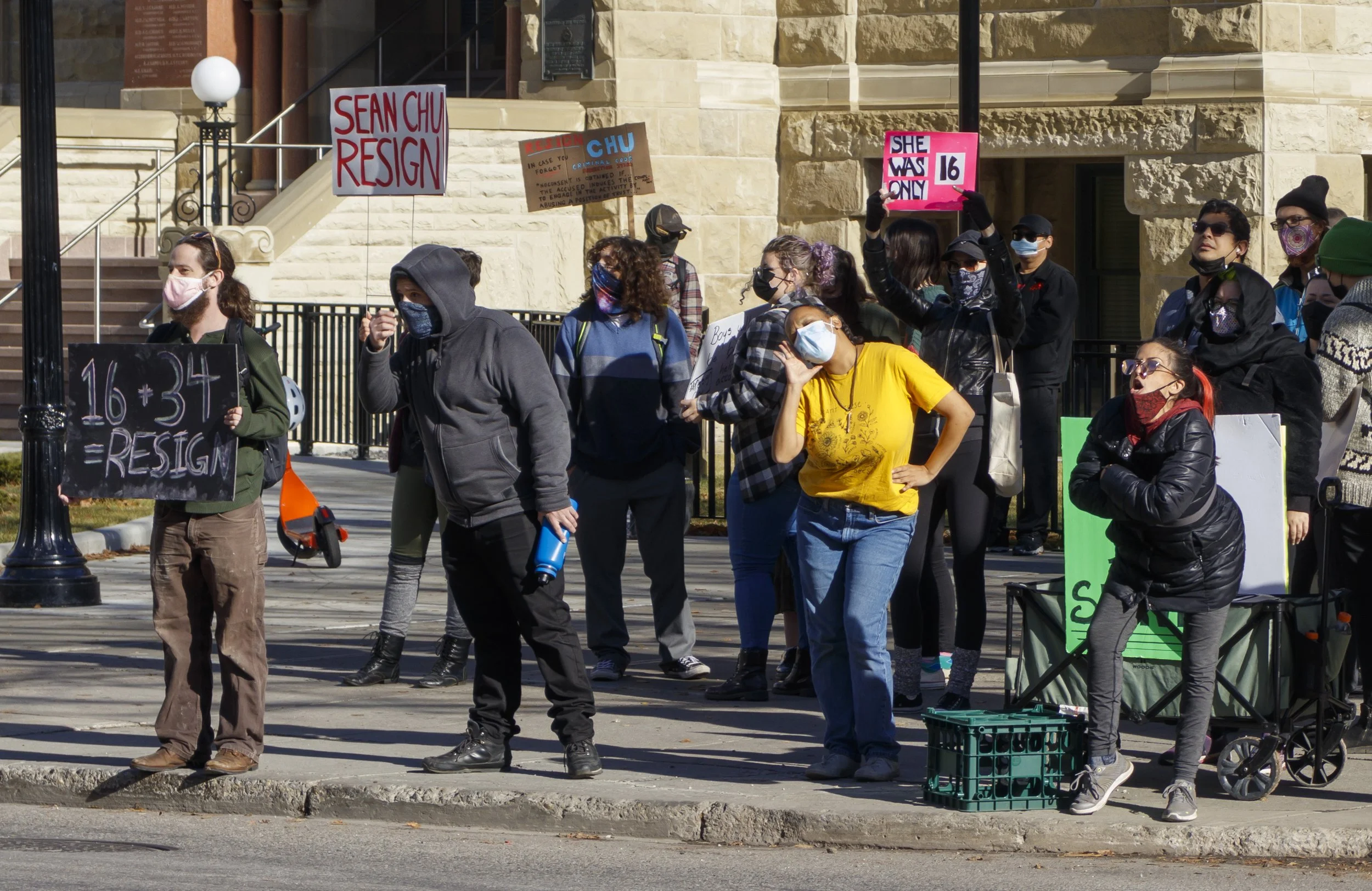 Protestors begin taunting and jeering at the anti-mask rally adjacent to their protest of why City Council member Sean Chu of Ward 4 should resign in front of City Hall on MacLeod Trail North. Downtown Calgary, AB, Canada 17/10/2021