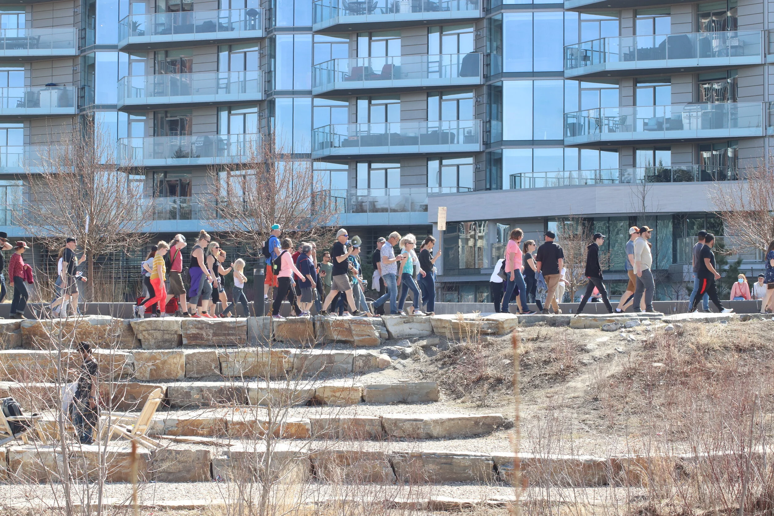 The Walk For Freedom march begins with protestors leaving Princes Island Park making for the Peace Bridge then Memorial Drive south bound in Calgary AB on 17/04/2021