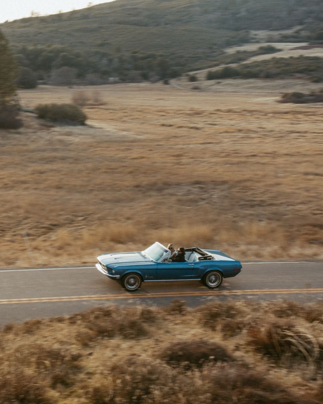There&rsquo;s something about an engagement session that starts with the windows down and no real destination &mdash; just two of you, a stretch of winding road, and your classic car humming beneath you.

It&rsquo;s less &ldquo;pose here&rdquo; and m