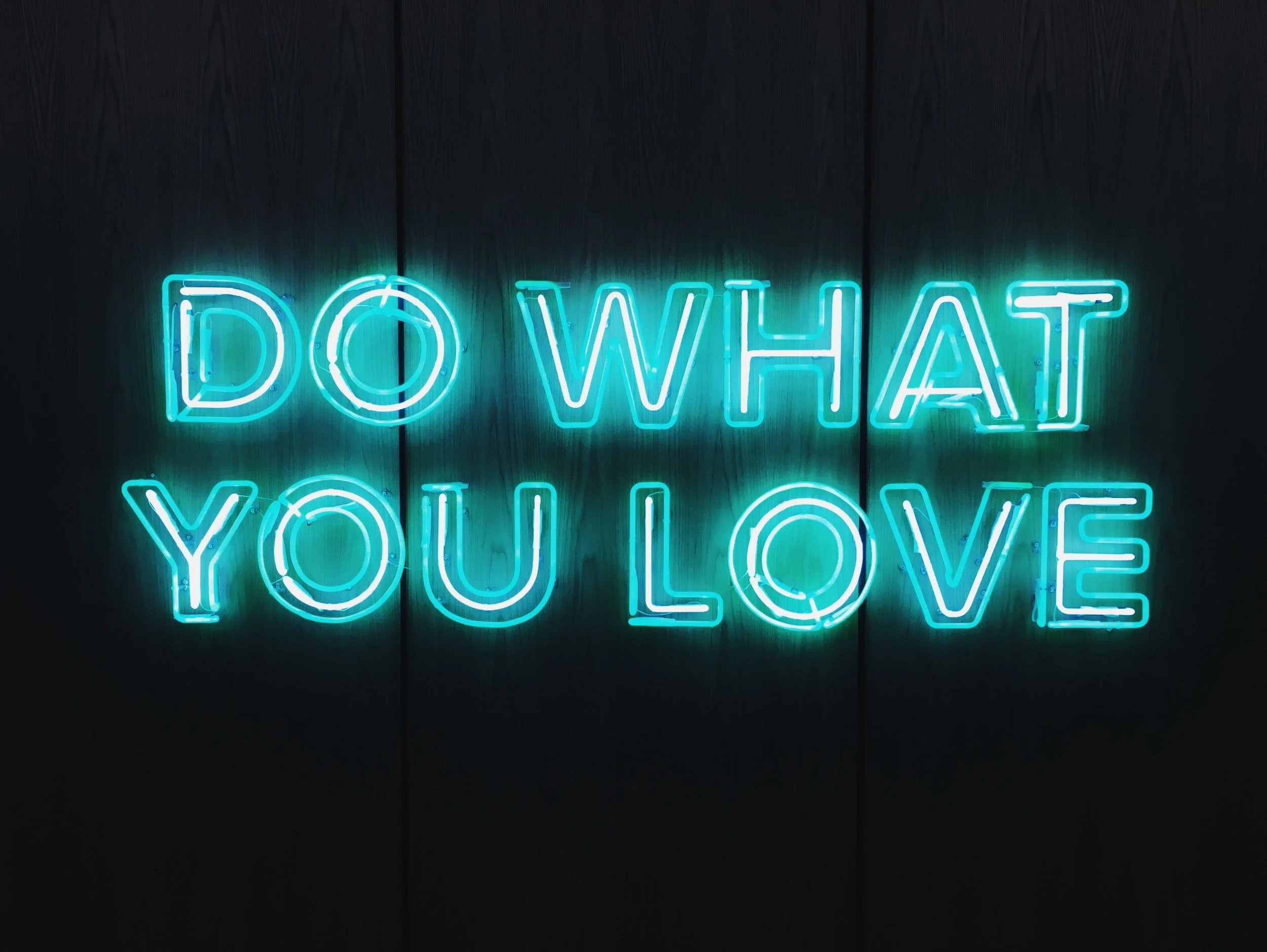 Neon sign that reads: Do what you love.