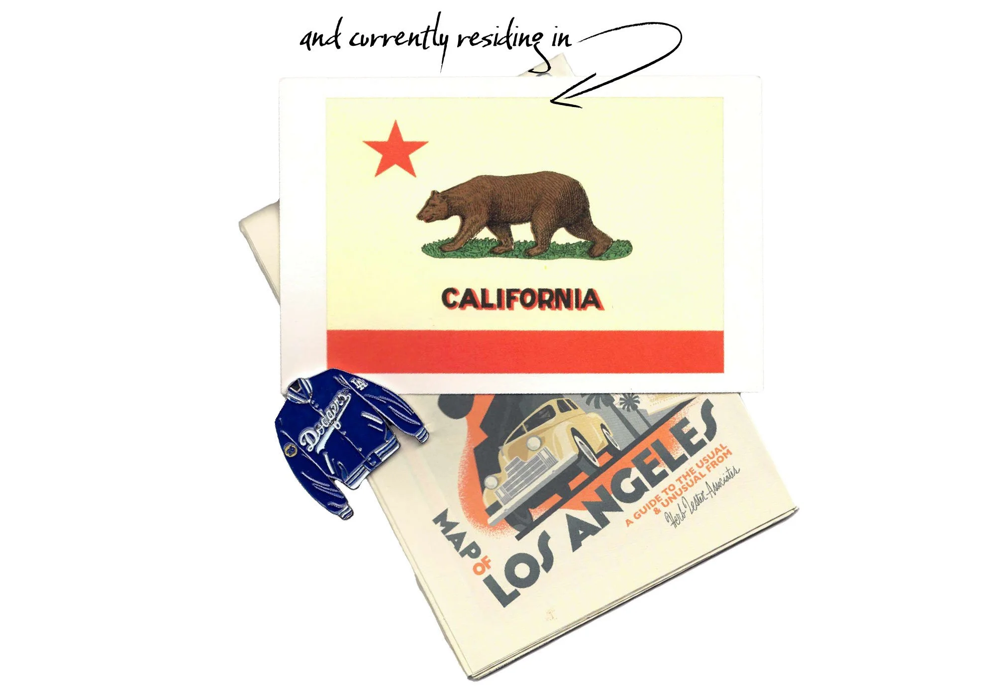California state flag, a blue Los Angeles guidebook with a yellow car on the cover, and a blue Dodgers jacket.