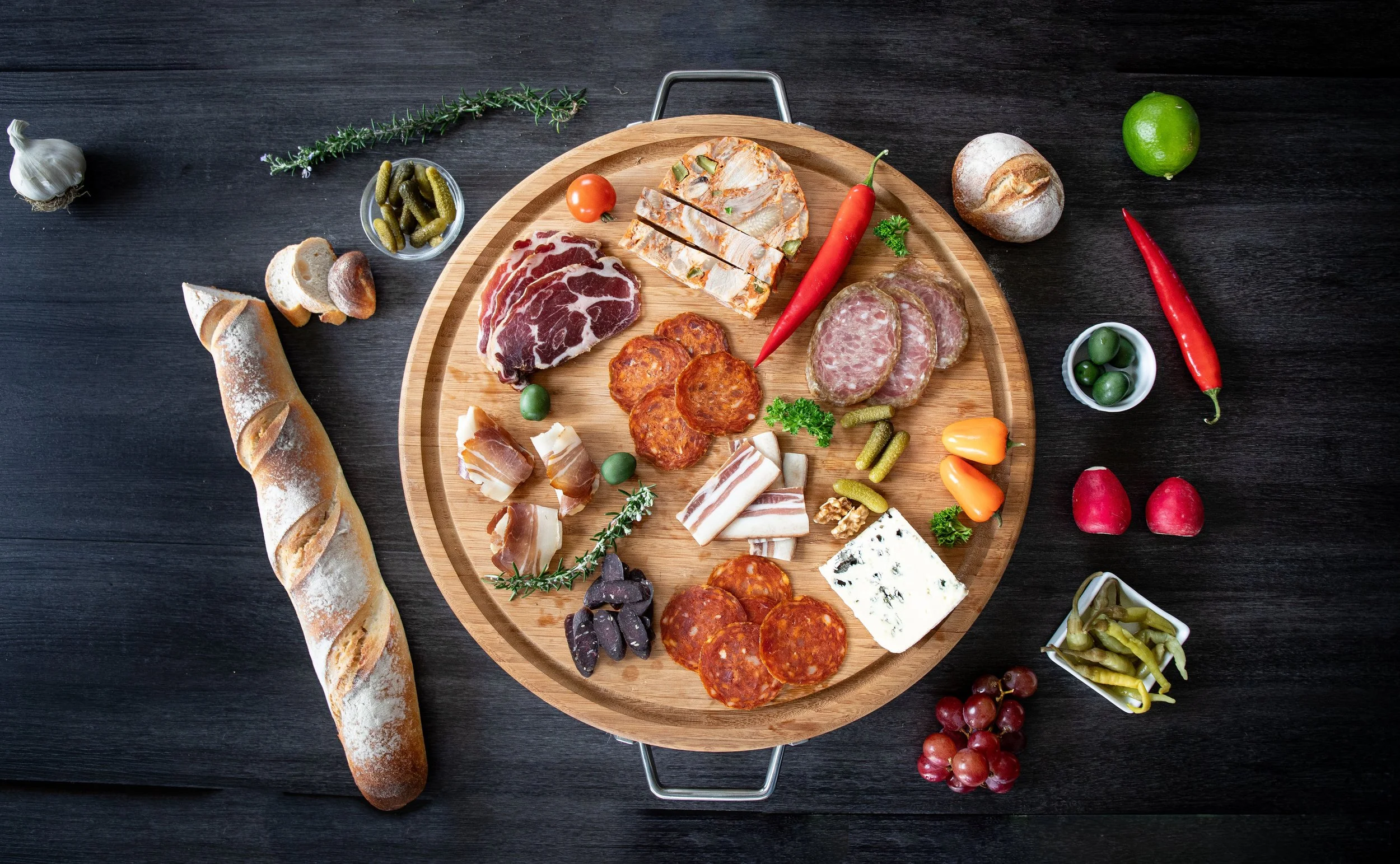 A platter brimming with OFPA Medal WinningSalash Family-Inspired Artisan Meats.jpg