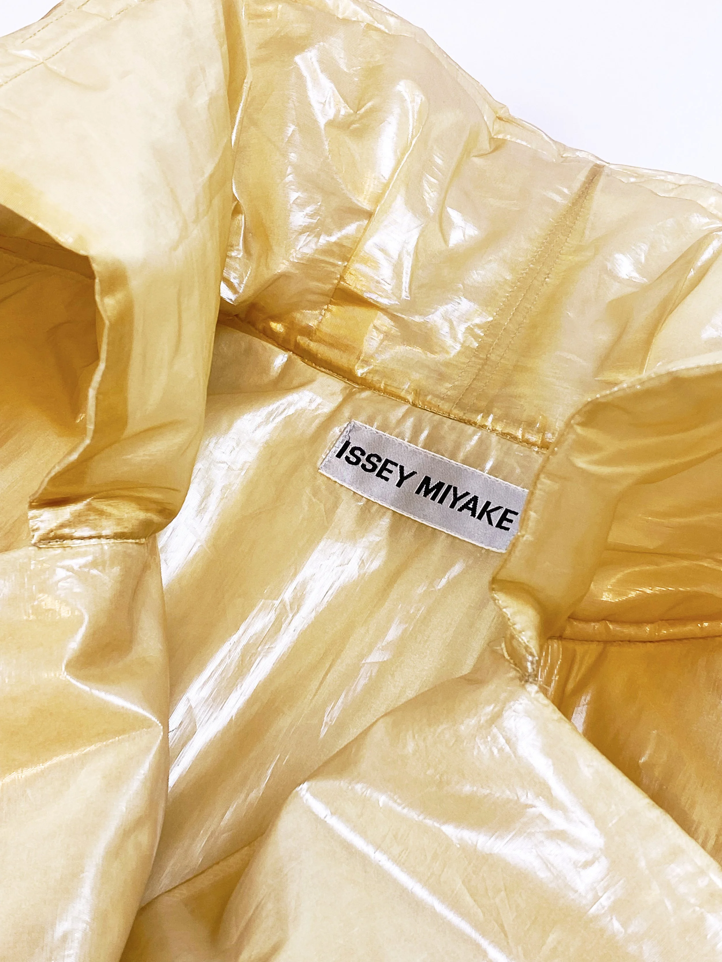 ISSEY MIYAKE Shiny Cropped Plastic-y wide silhouette Puffer Jacket 603.jpg