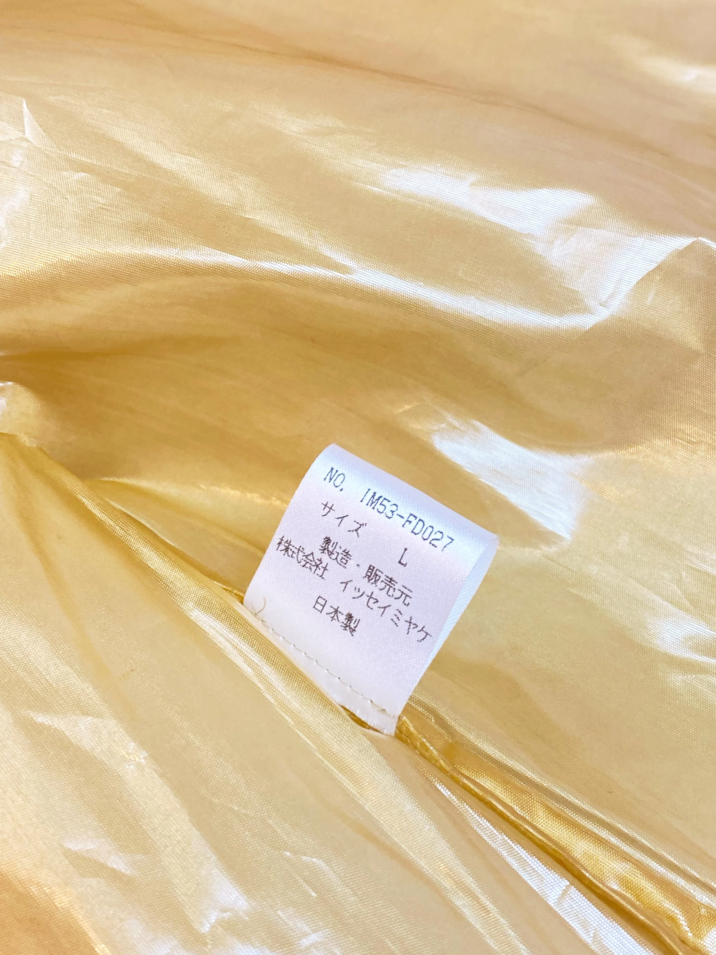 ISSEY MIYAKE Shiny Cropped Plastic-y wide silhouette Puffer Jacket 612.jpg