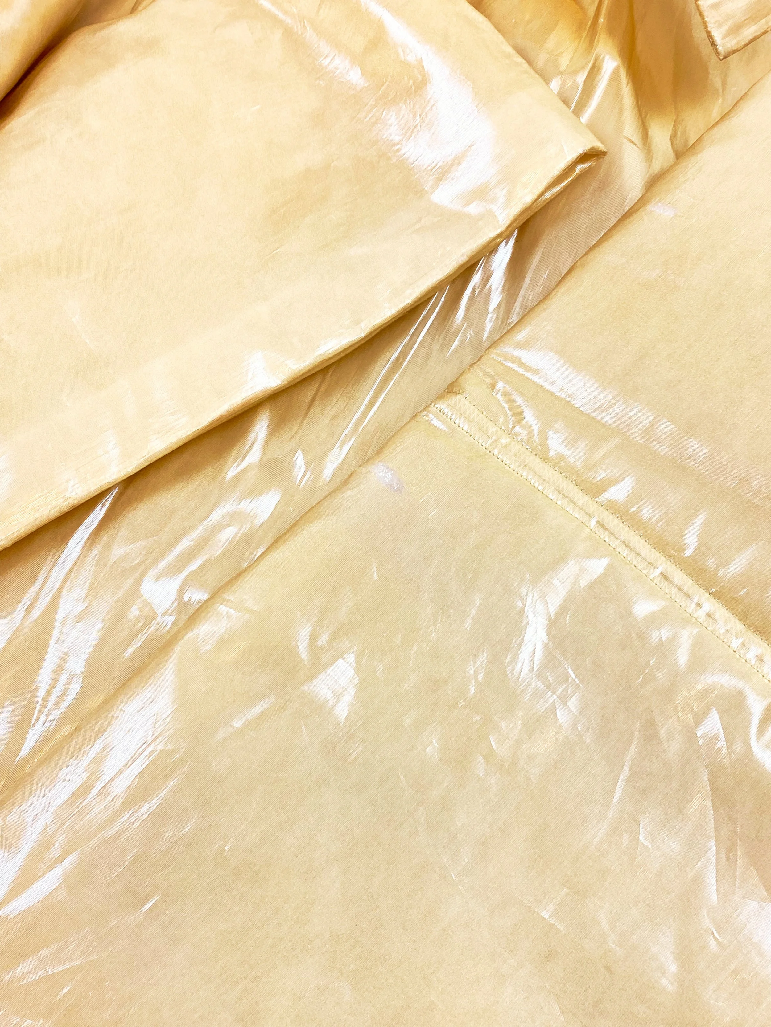 ISSEY MIYAKE Shiny Cropped Plastic-y wide silhouette Puffer Jacket 604.jpg