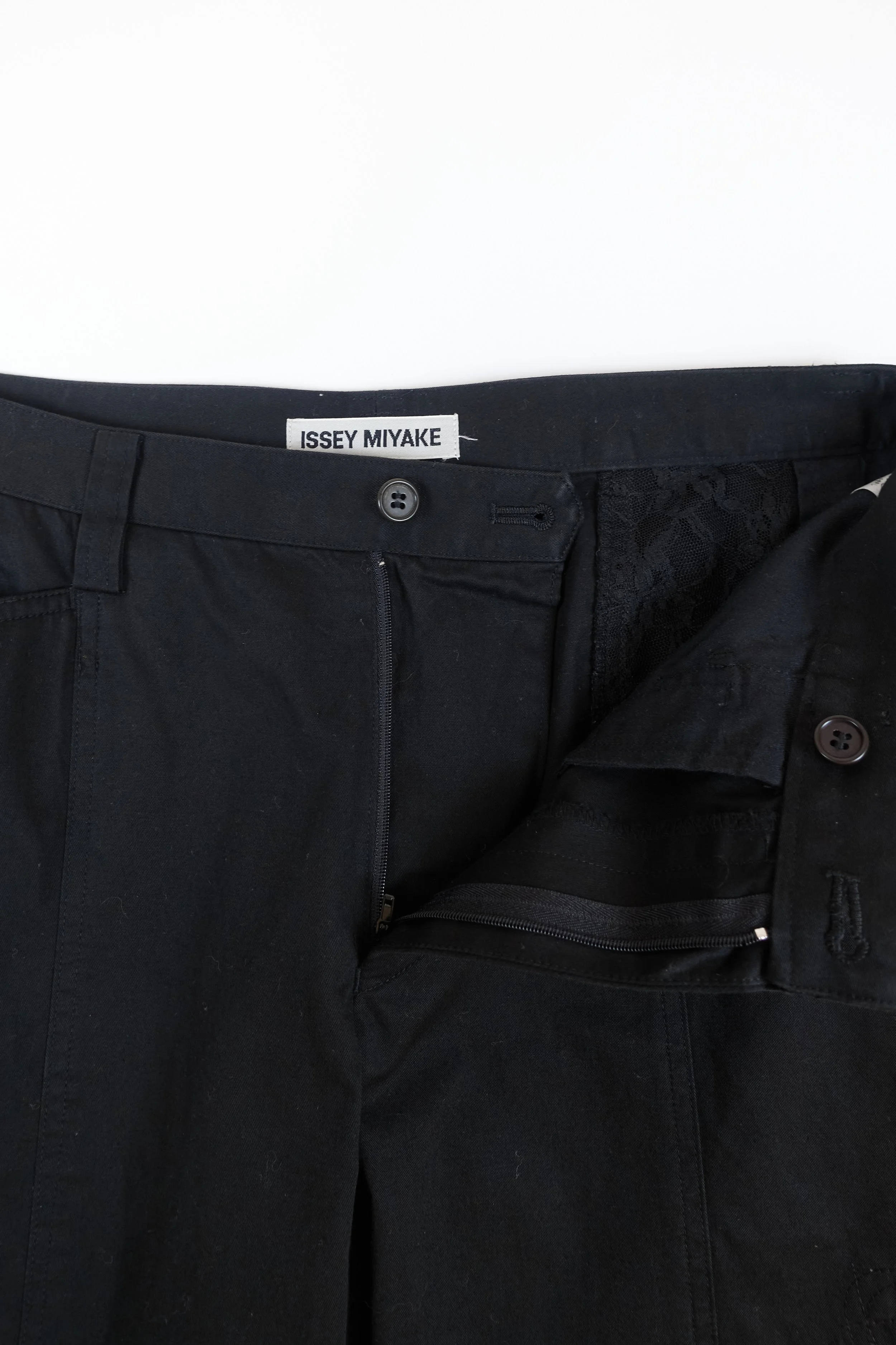 ISSEY MIYAKE black lace cutout trousers 889 220512.jpg