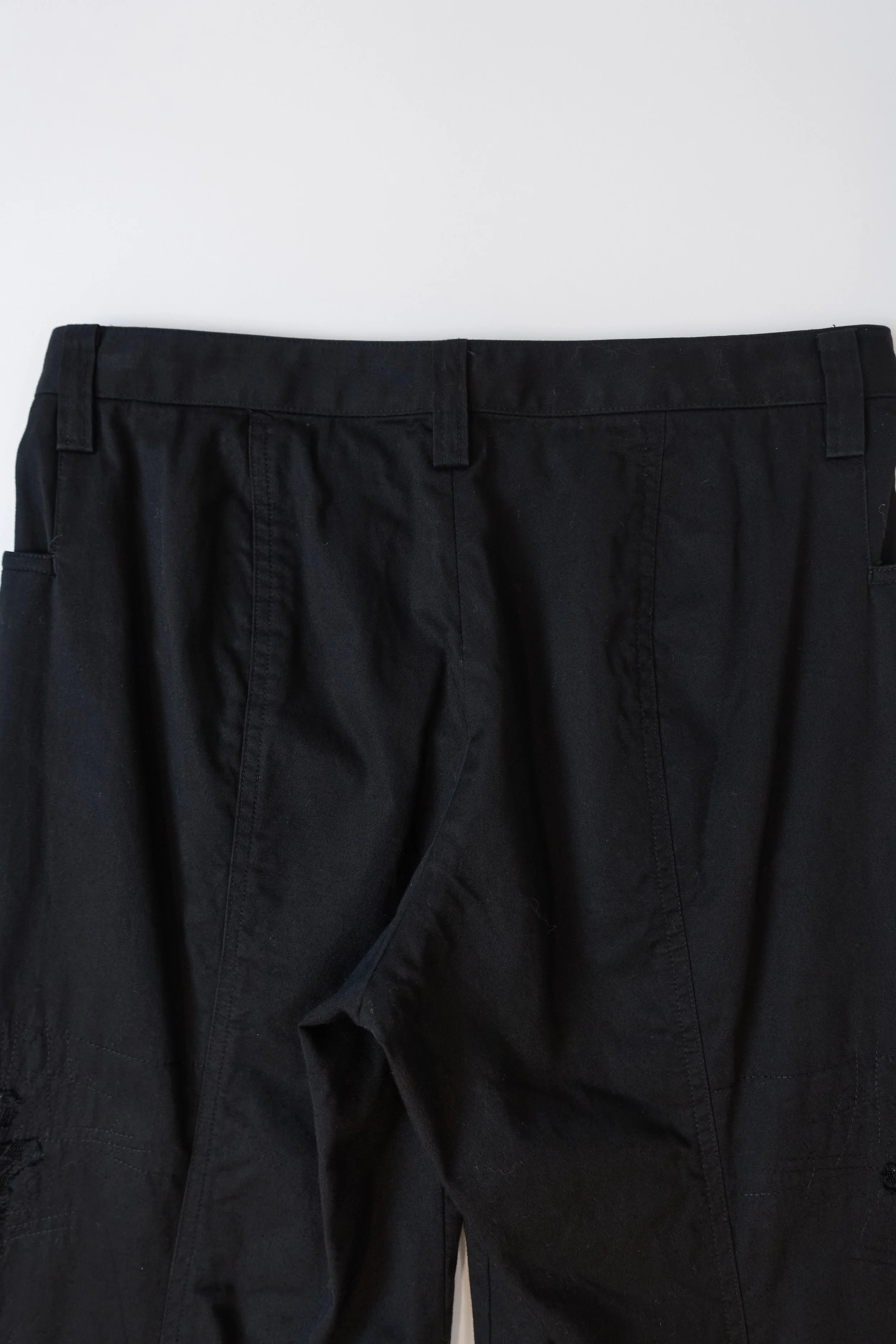 ISSEY MIYAKE black lace cutout trousers 892 220512.jpg