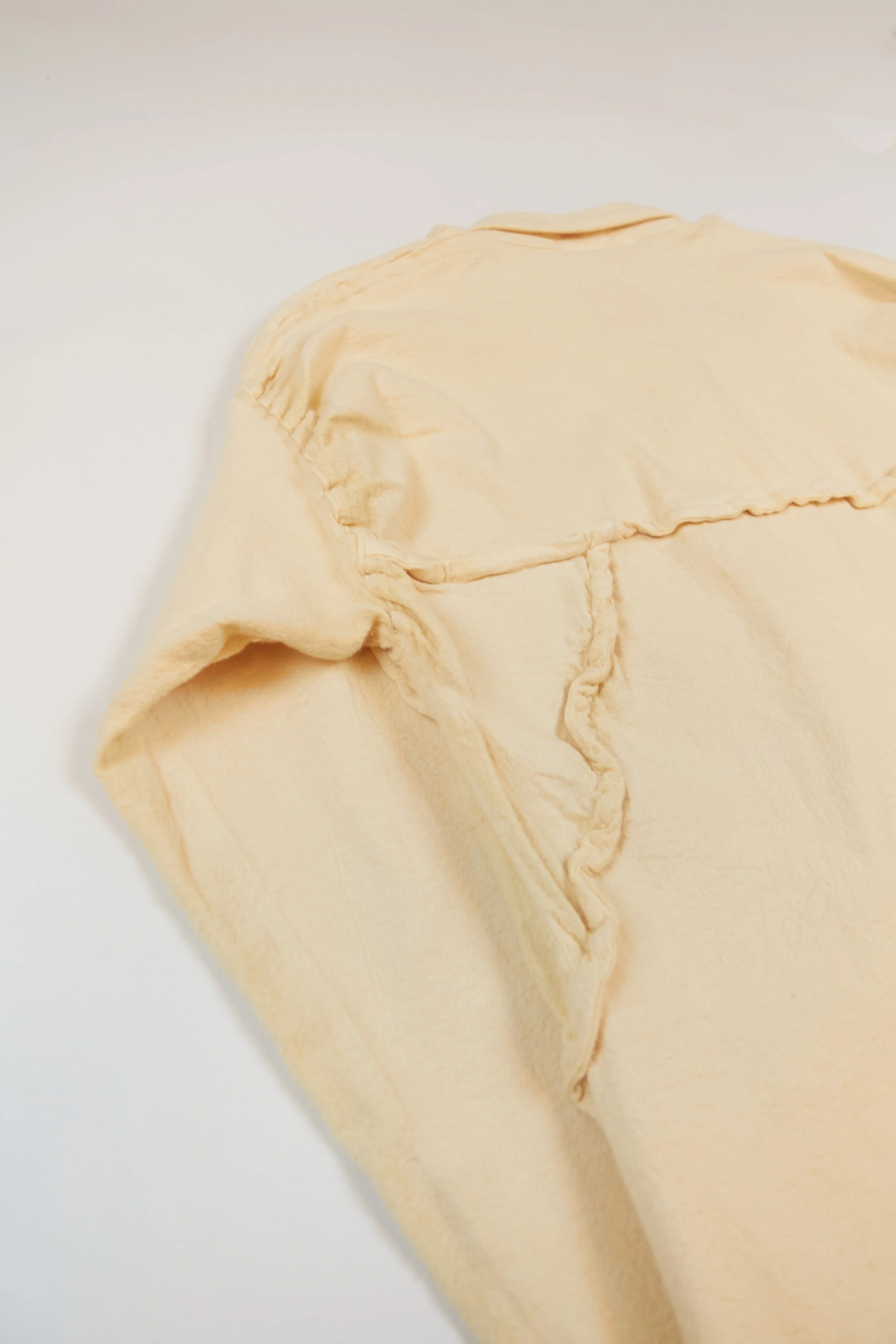 Issey Miyake stretchy shirt detail - exaggerated seams