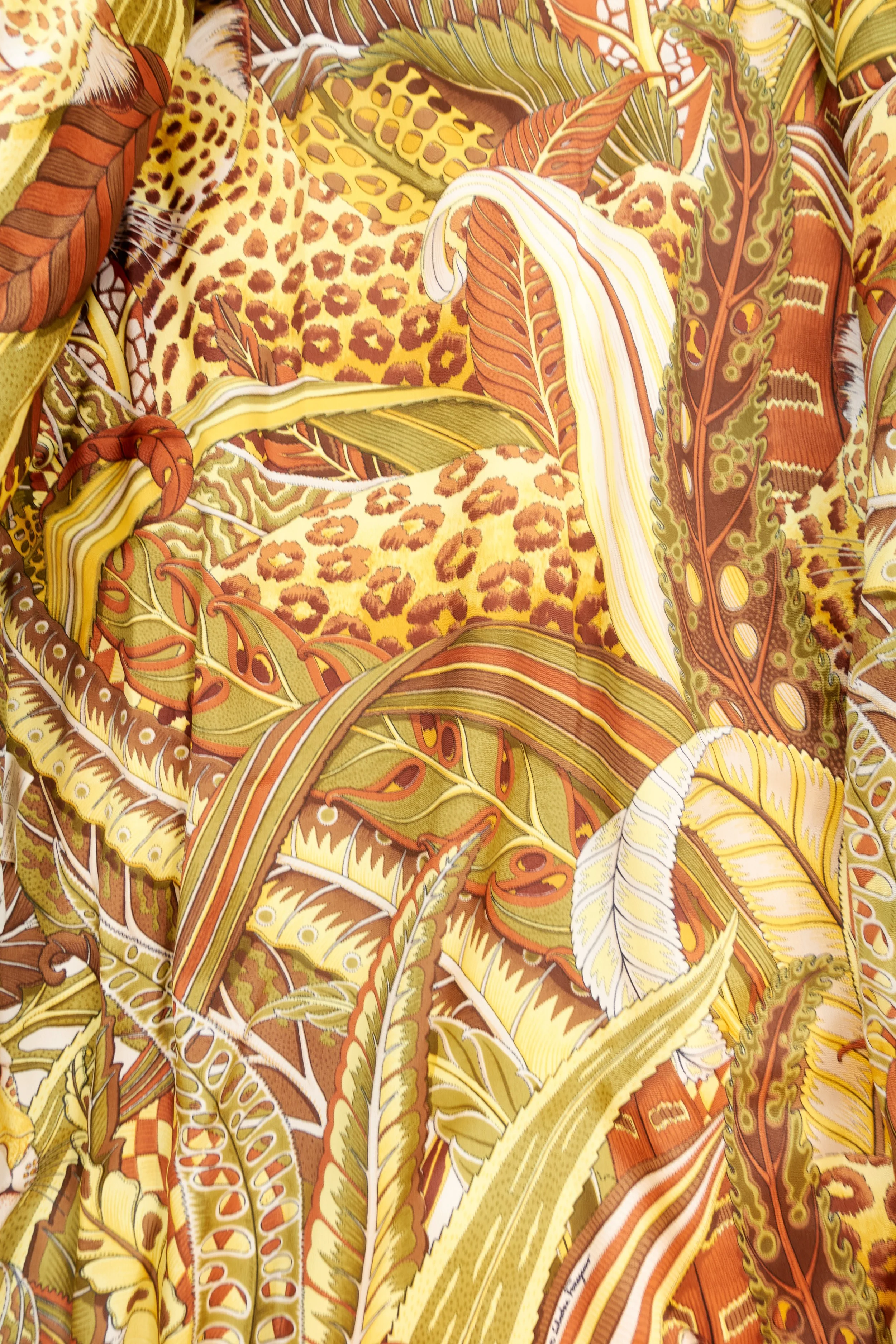 Slavatore Ferragamo wide silhouette puffer with Ferragamo lining 0041-884.jpg