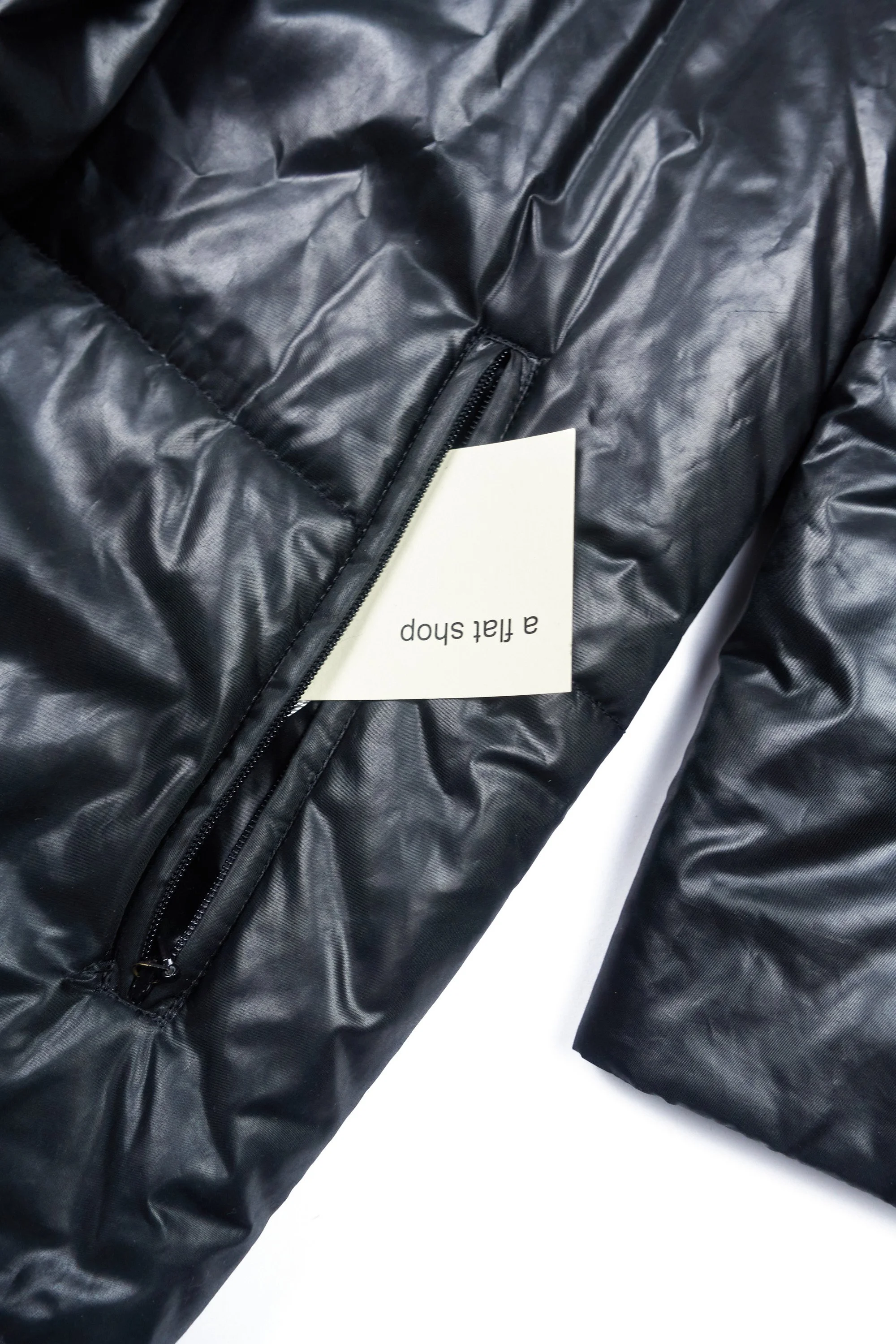 230608 Issey Miyake FETE rubbish bag coat 3.jpg