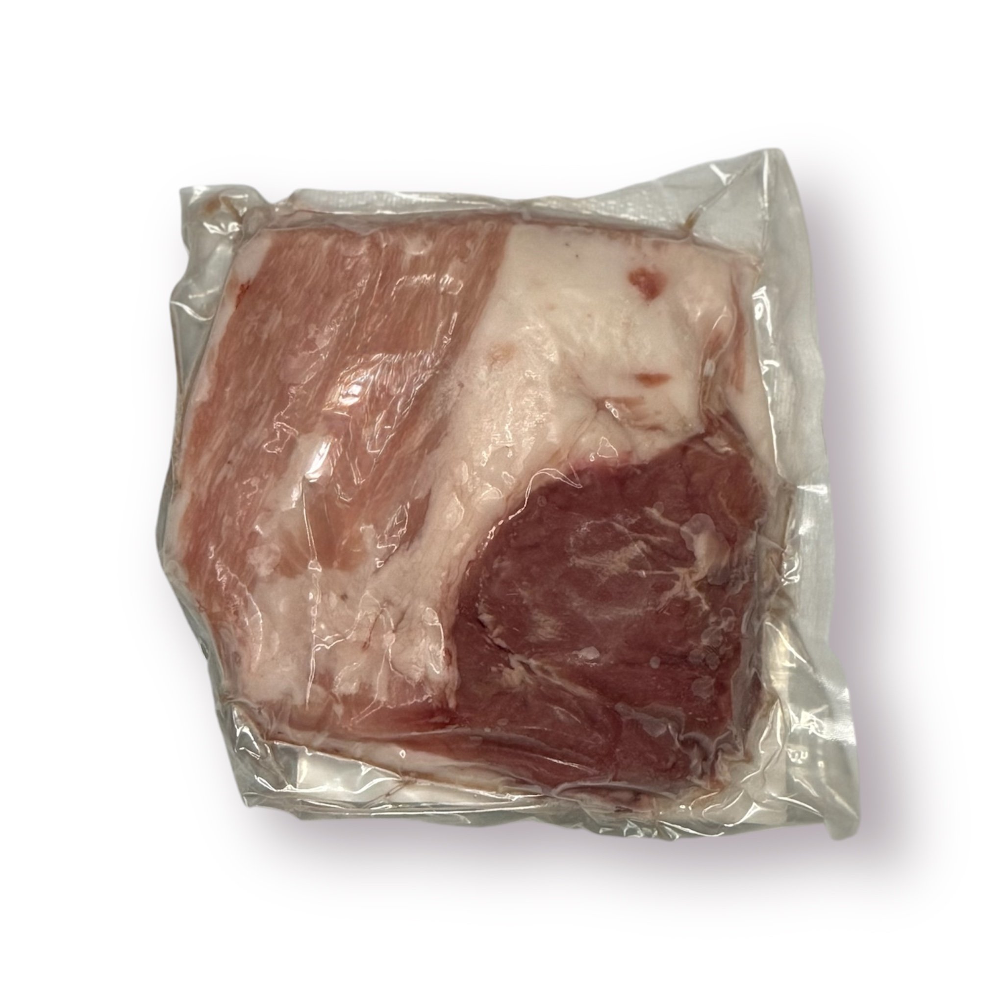 whole pork jowl, vacuum-sealed in clear packaging, set against a clean white background.