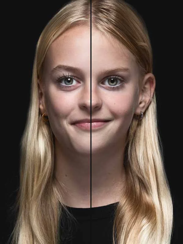 Een close-up van een lachende jonge vrouw met lang blond haar, frontal gezichtsbeeld, zwart achtergrond, met een verticale lijn die haar gezicht in tweeën splitst.