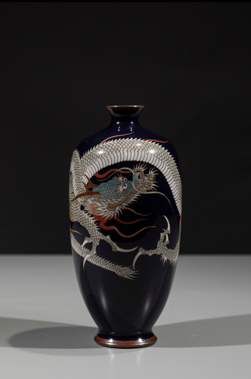 Late 19th century, Japan,  Meiji period, cloisonné vase with a midnight-blue ground decorated with a coiling dragon 