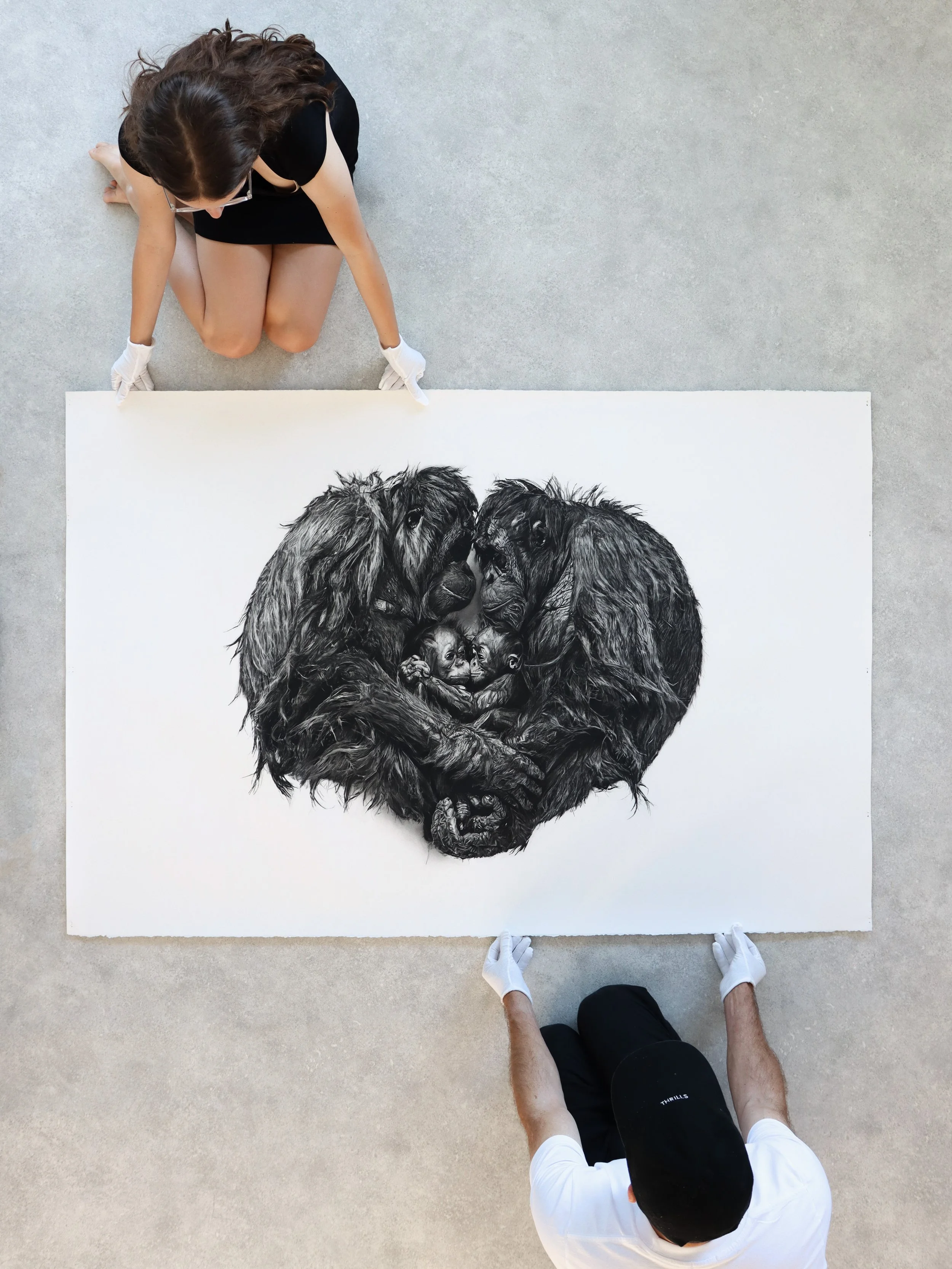 Within charcoal artwork by Rob Harris shown at museum scale