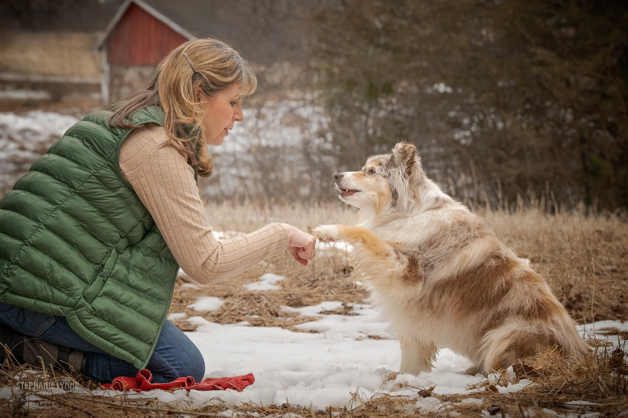A woman and her Australian Shepherd