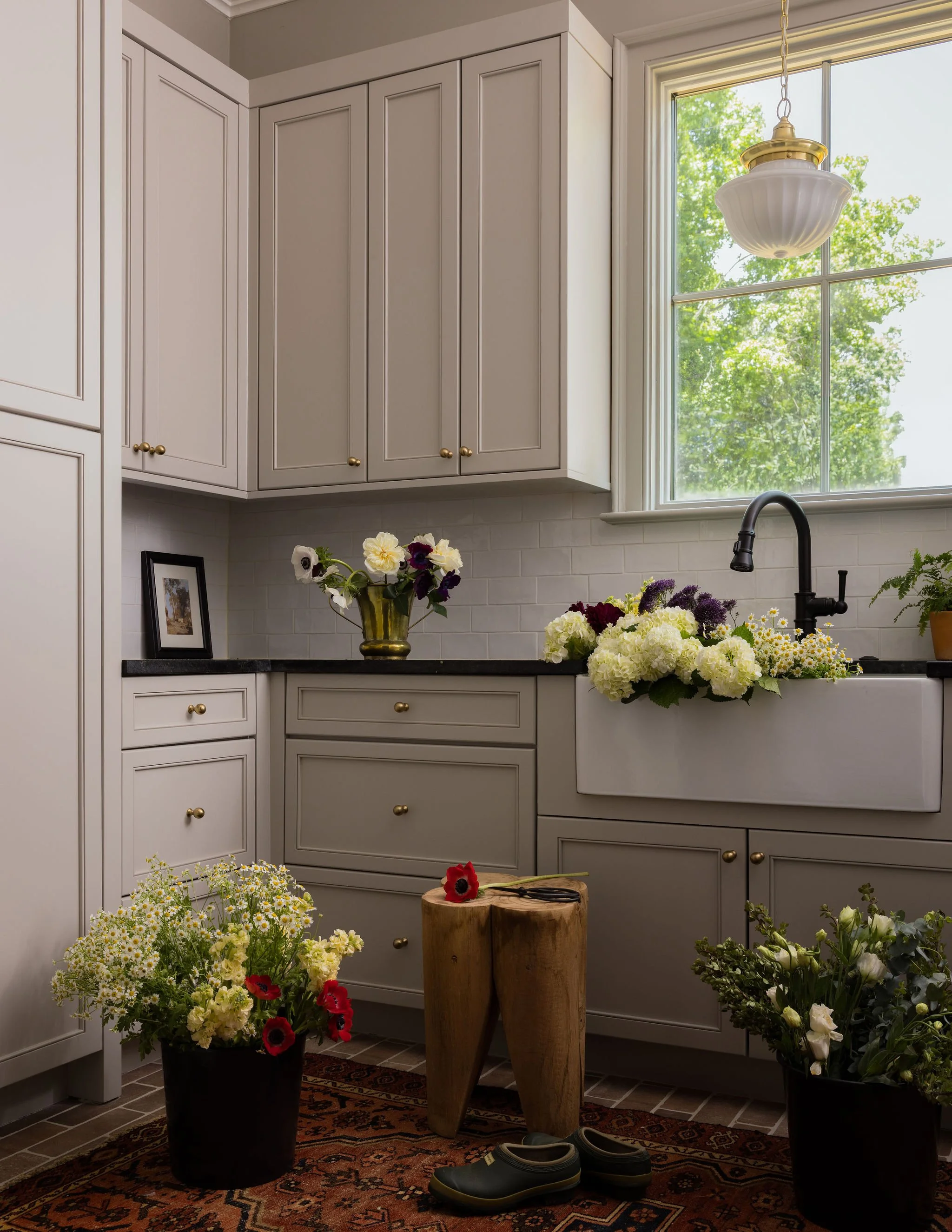 Scullery design, warm creamy taupe cabinets, farm sink, kitchen design