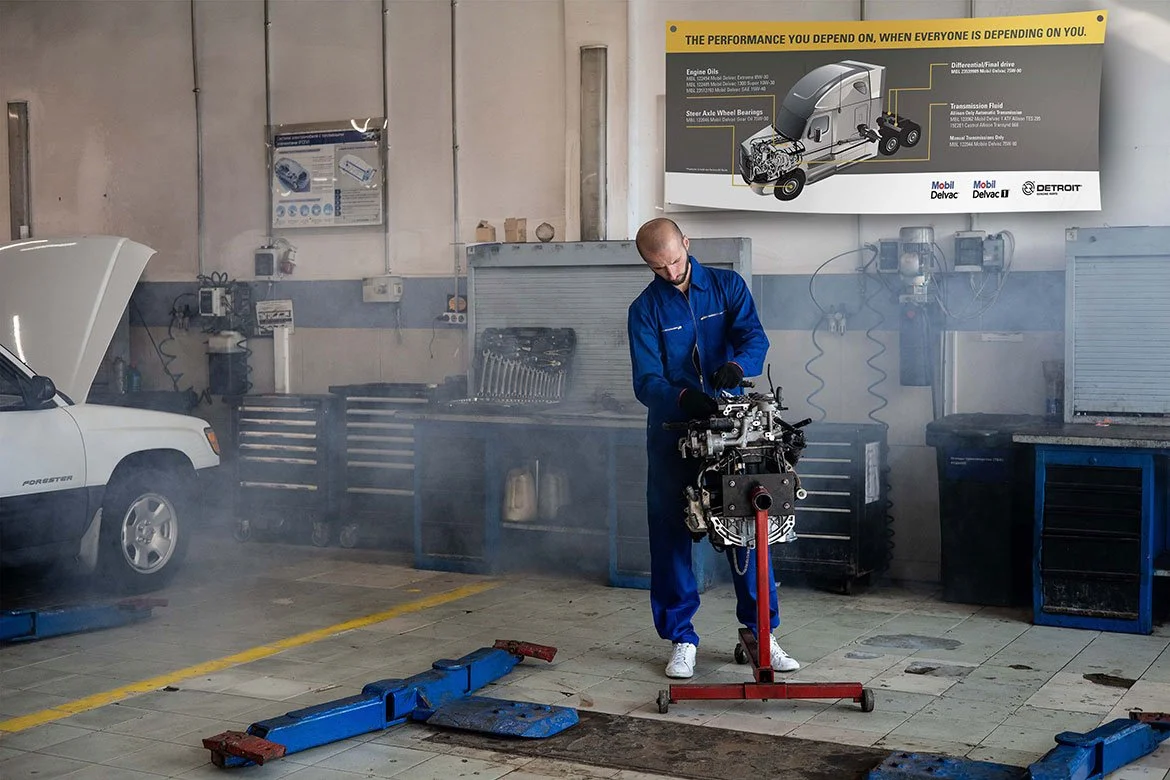 a person working on a motor at W.W. Williams