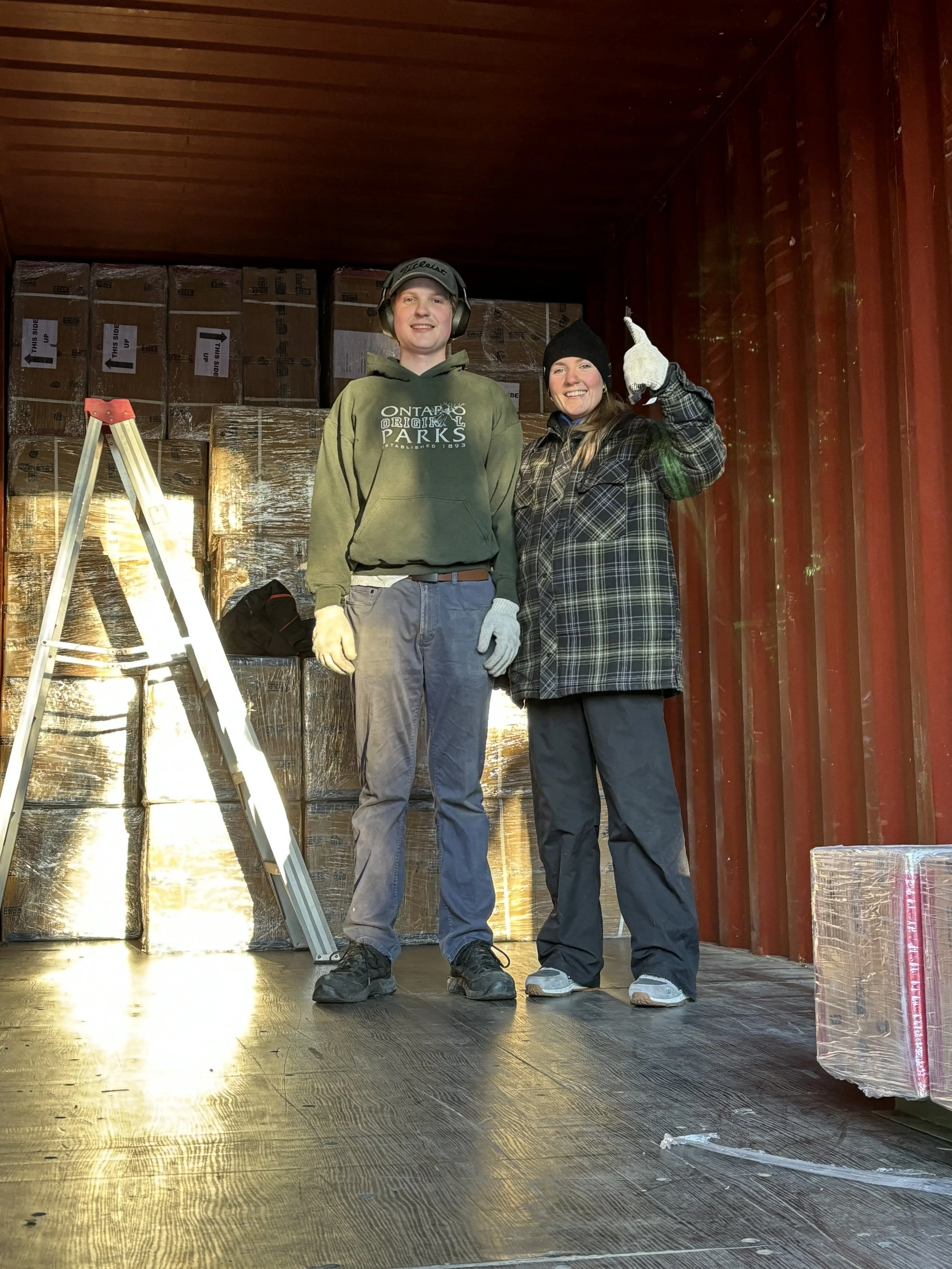Jack & Emily unloading a truck_January 2025.JPG