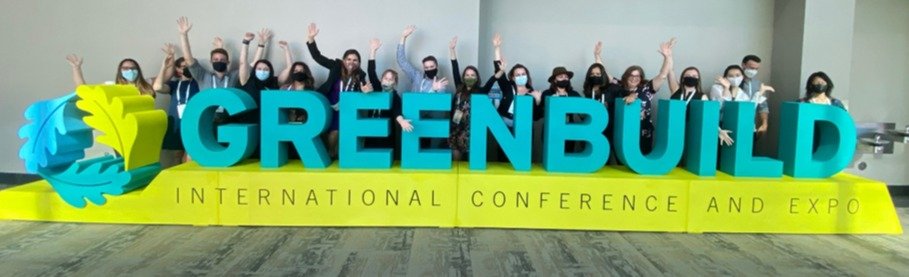Photo of Verdani Partners employees with Greenbuild International Conference and Expo sign