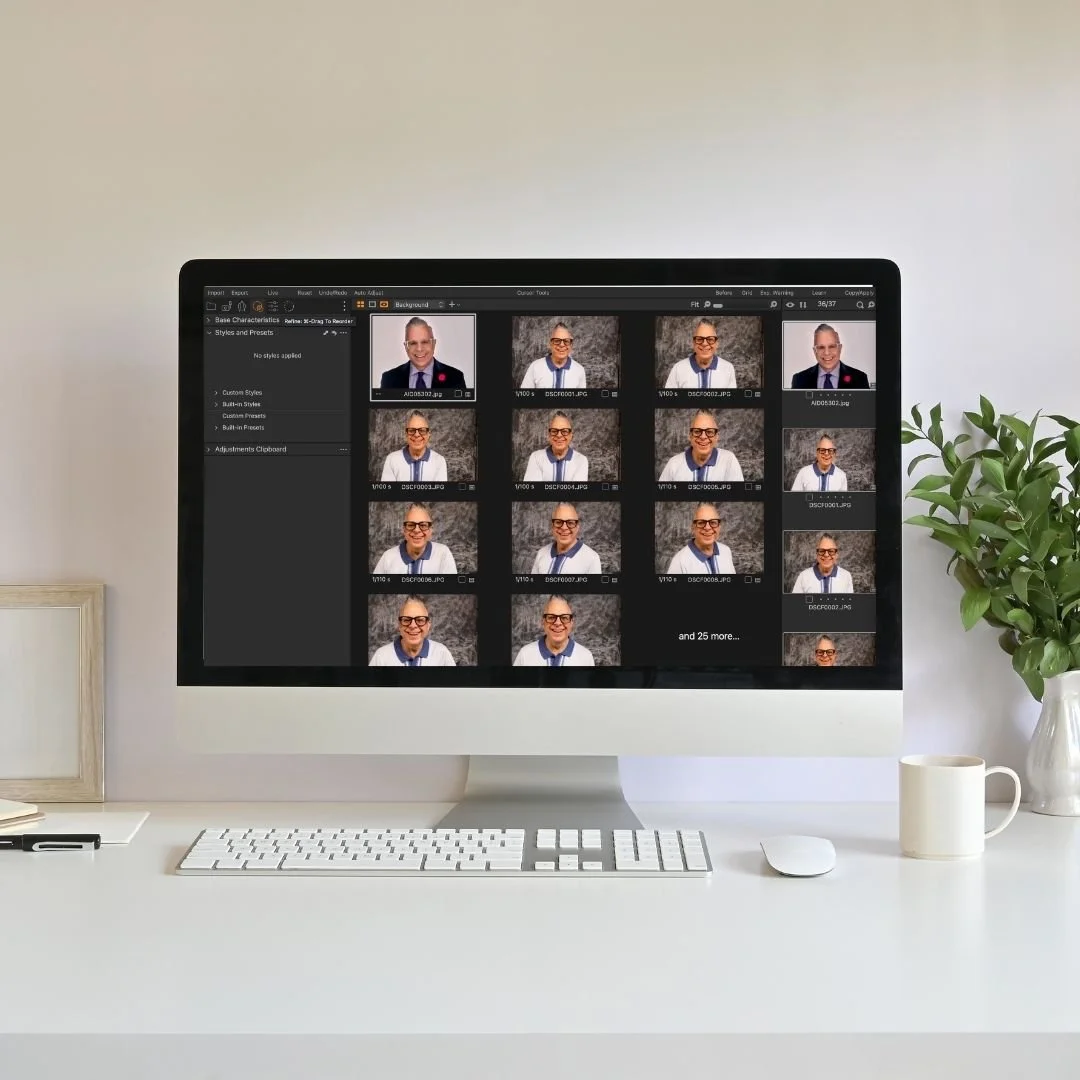 Capture Style's photo editing process shown on a Mac on a white desk