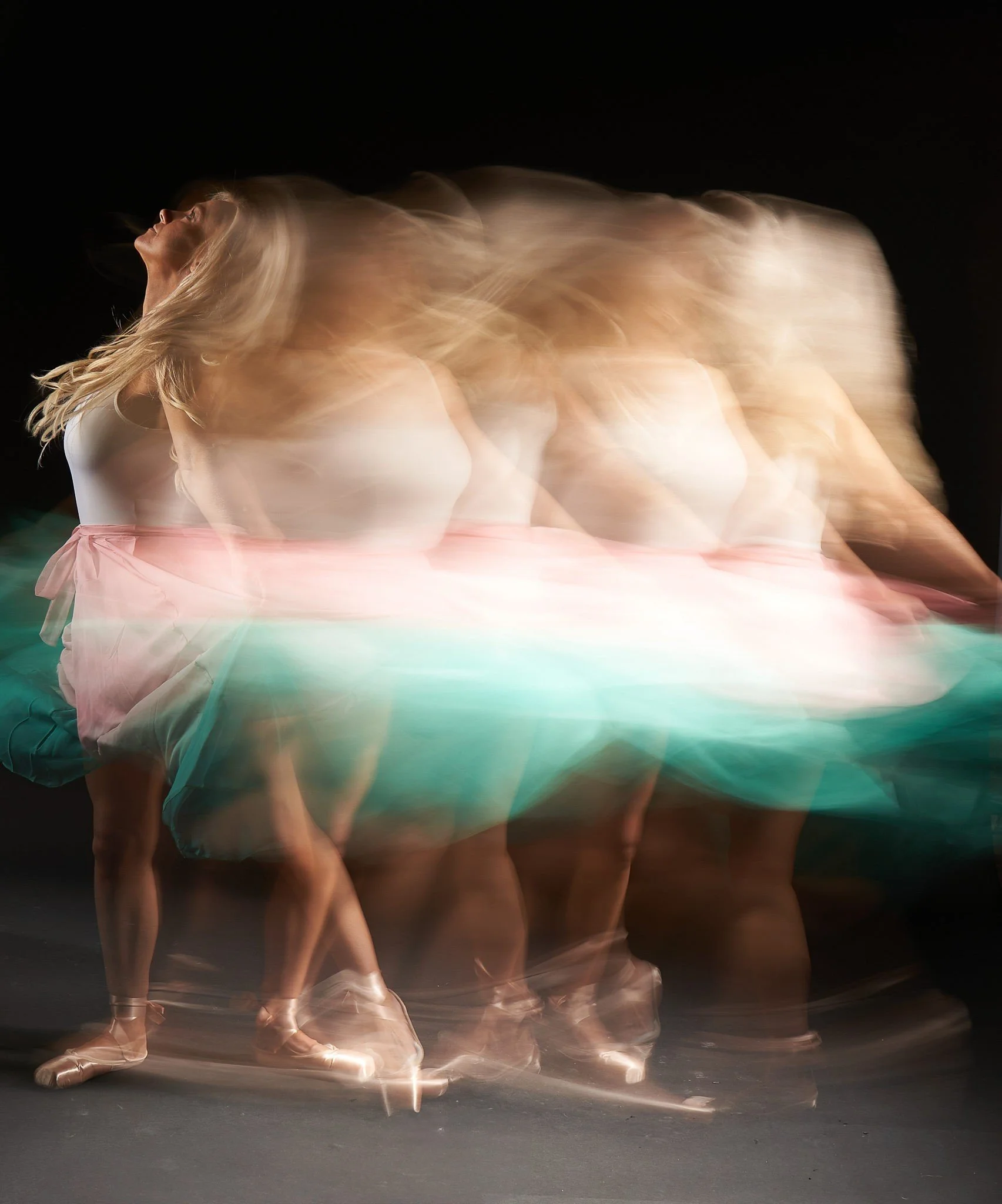 Portrait of a dancer but blurred to make it look as though she's constantly in movement