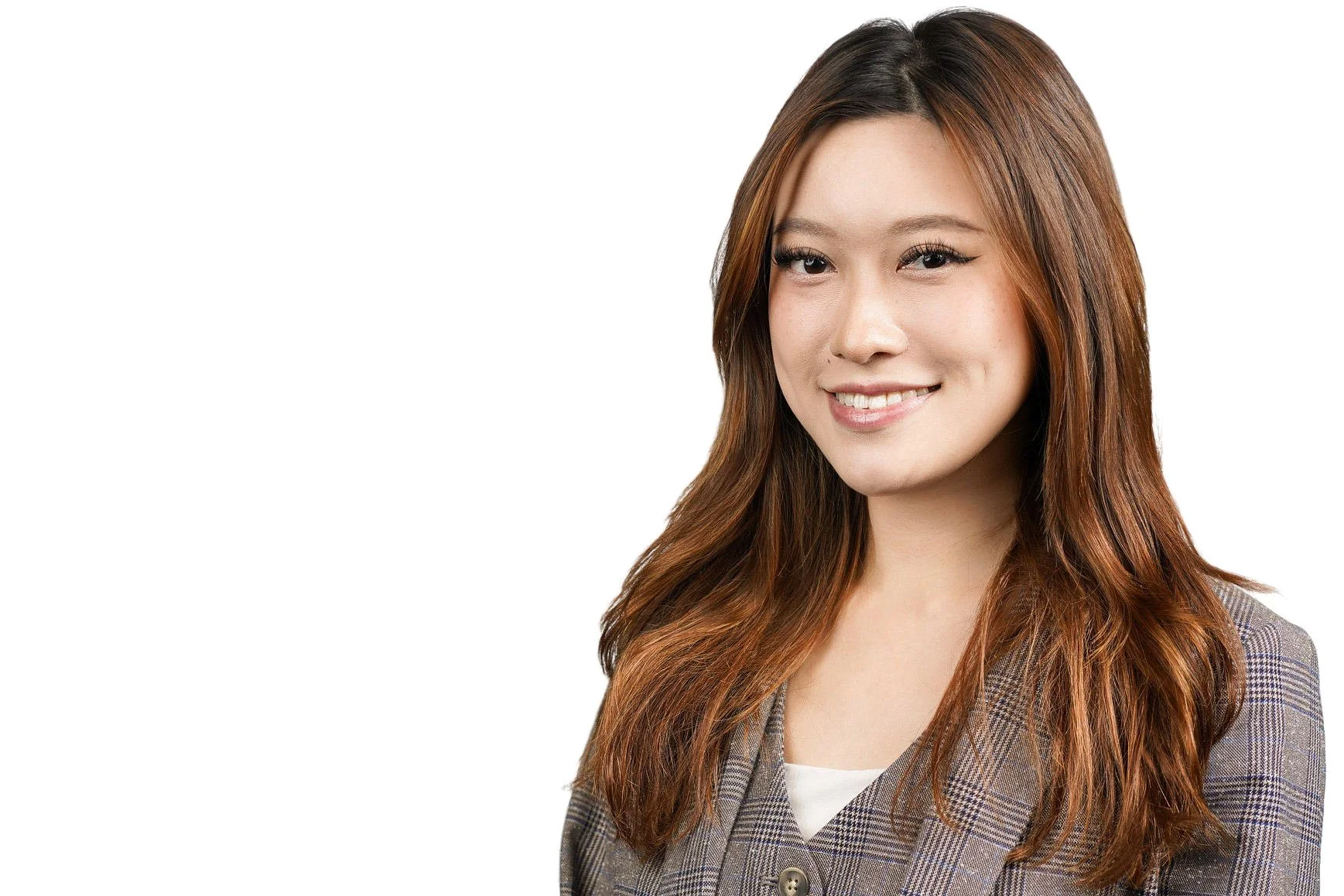 Headshot of a young Asian American woman with long brown hair. She is wearing a grey pants suit set.