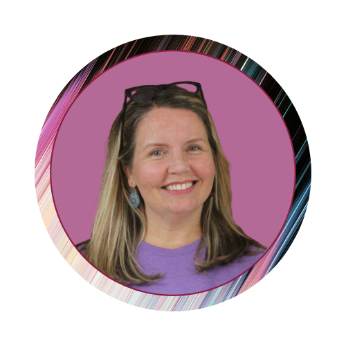 A woman with long hair, glasses on her head, wearing a purple top and earrings, smiling in front of a pink background with a colorful circular border.