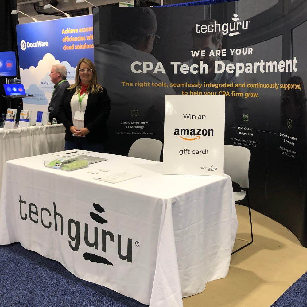 Trade show booth for Minneapolis-based IT company Tech Guru at an accounting conference. Backdrop says, "We are your CPA Tech Department."