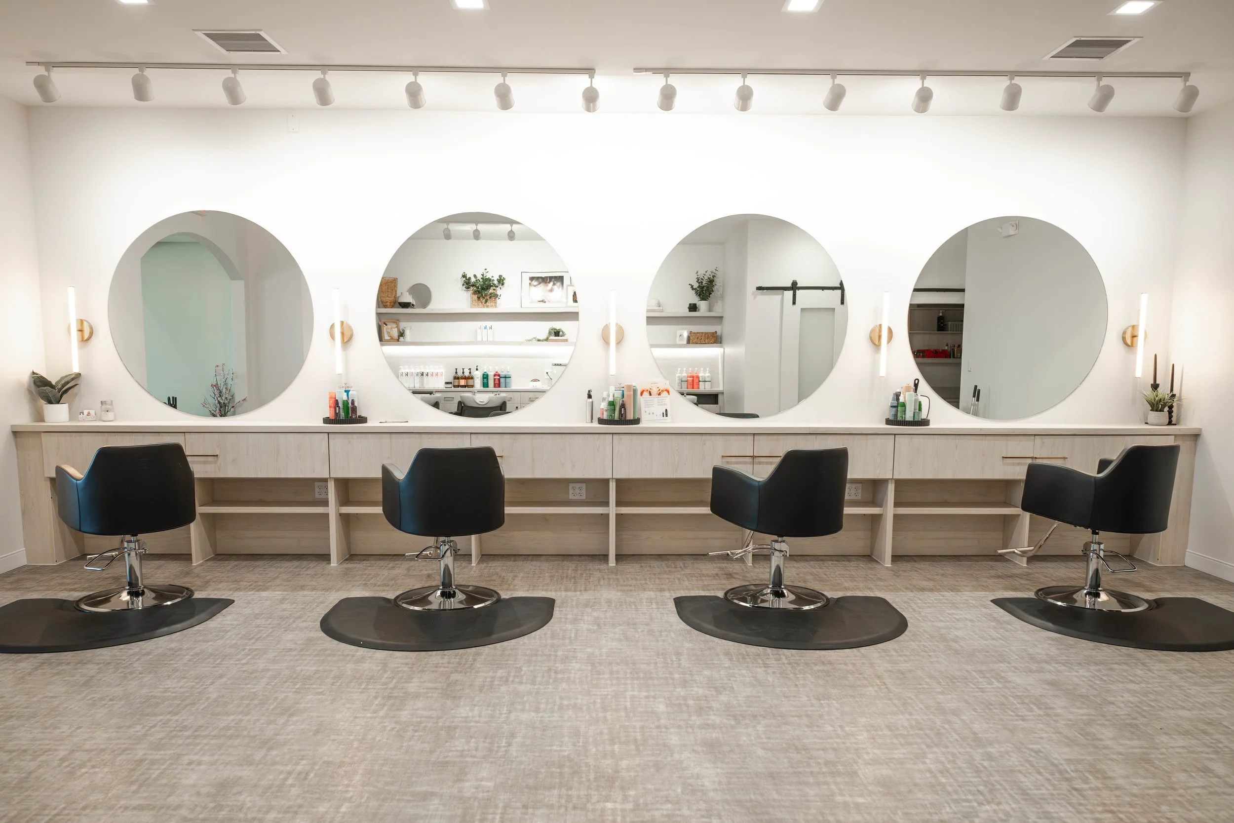 Custom LED lighting installation in Cedar Rose salon suite