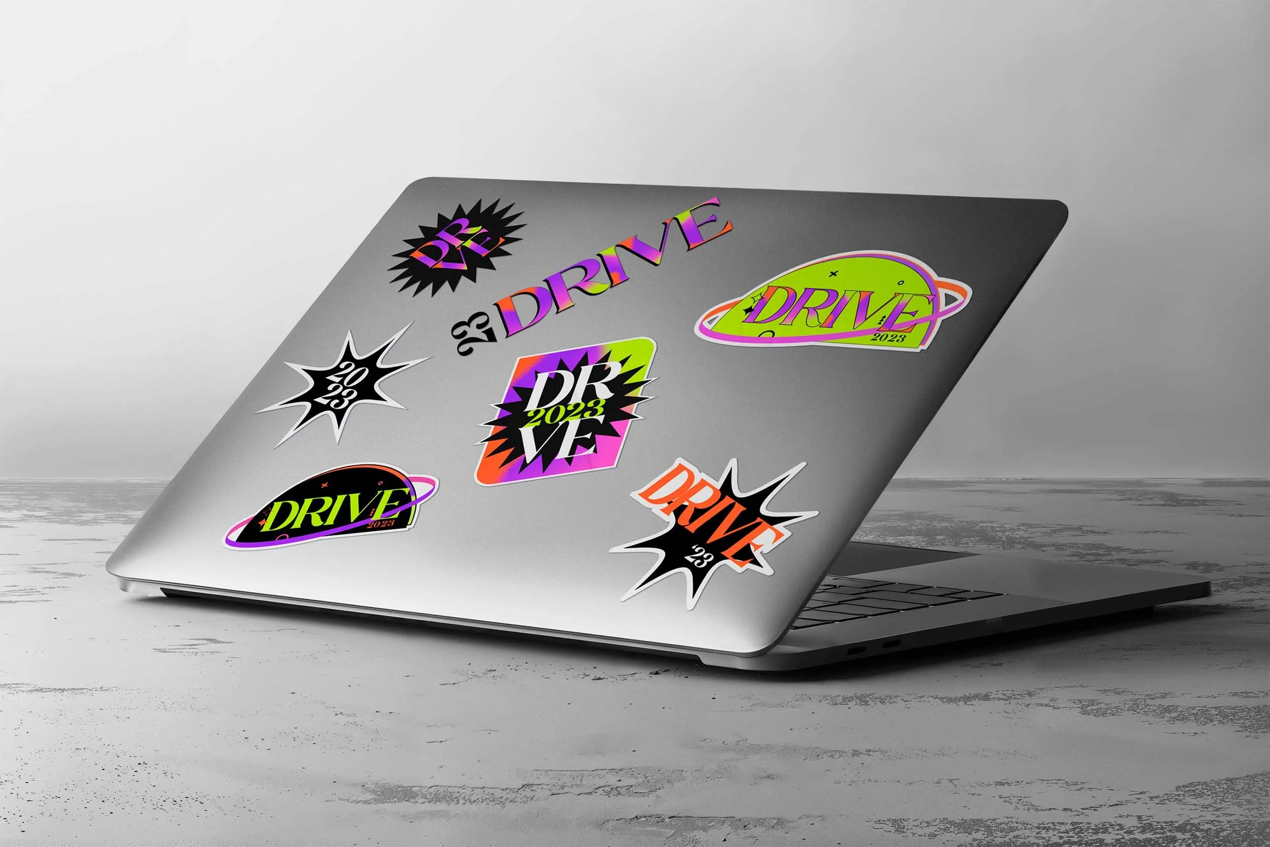 Drive23_sticker_laptop-mockup.jpg