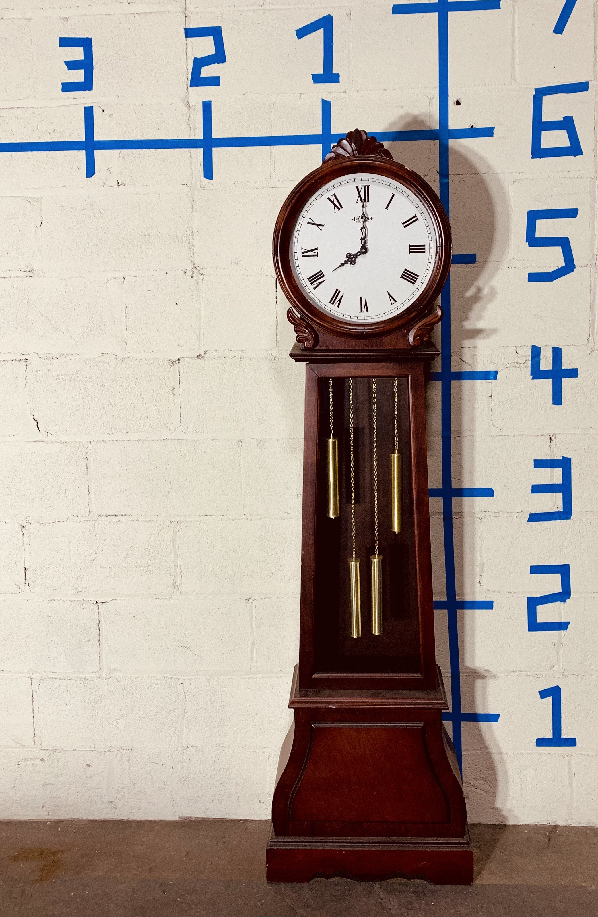 grandmother clock against wall with dimensions