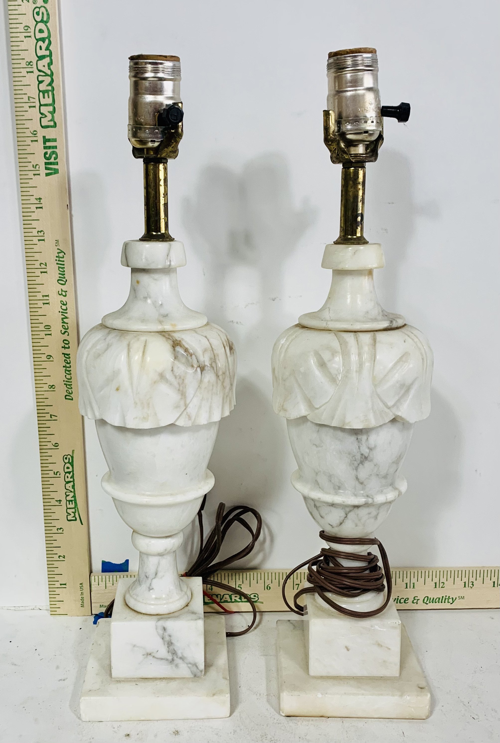 Pair of carved white marble table lamps without shades