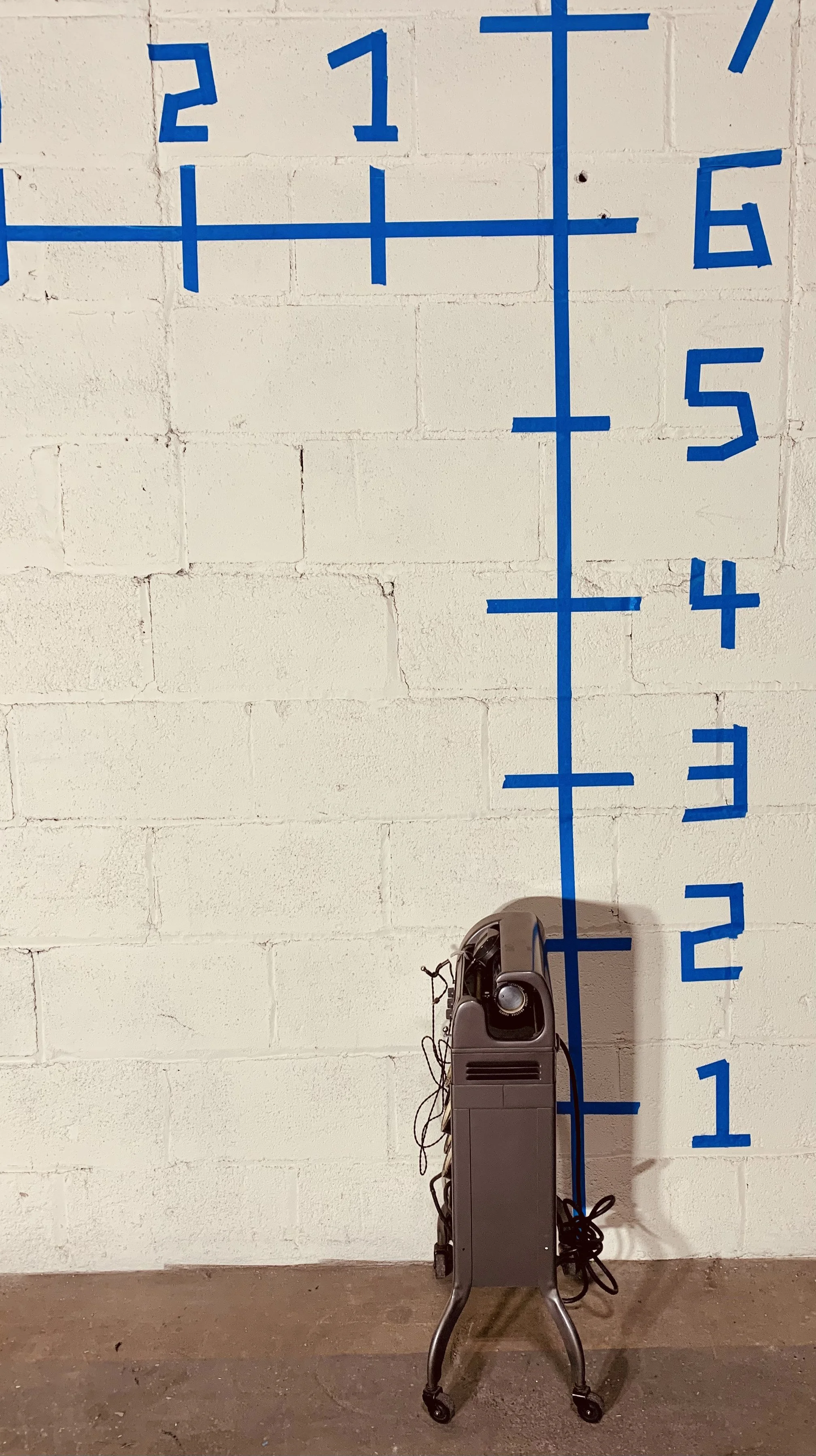 side view vintage dictaphone transcribing machine against wall with dimensions