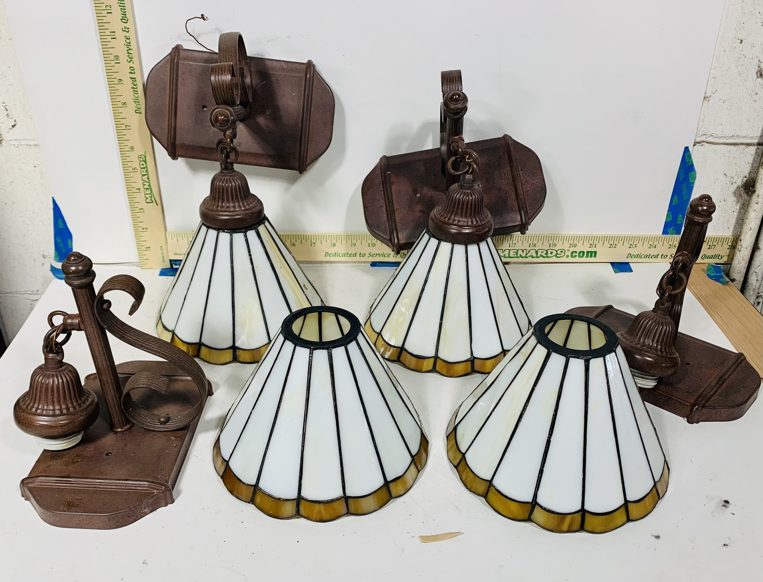 Stained glass wall sconces, four shown