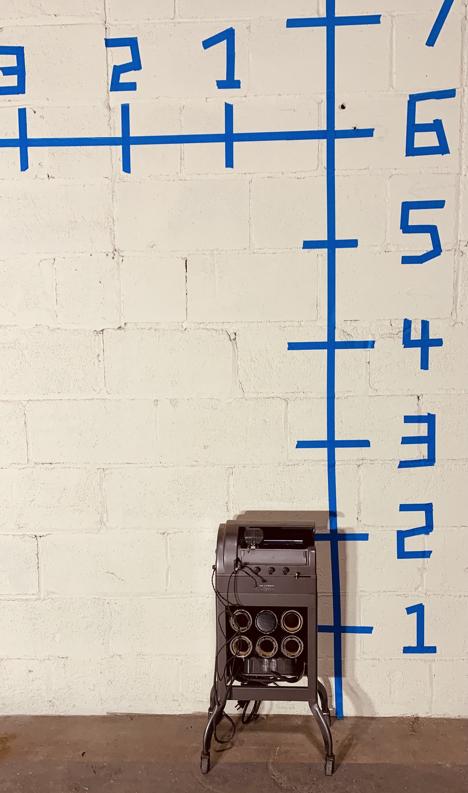 vintage dictaphone transcribing machine against wall with dimensions
