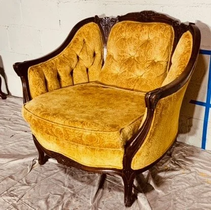 vintage yellow armchair on dropcloth