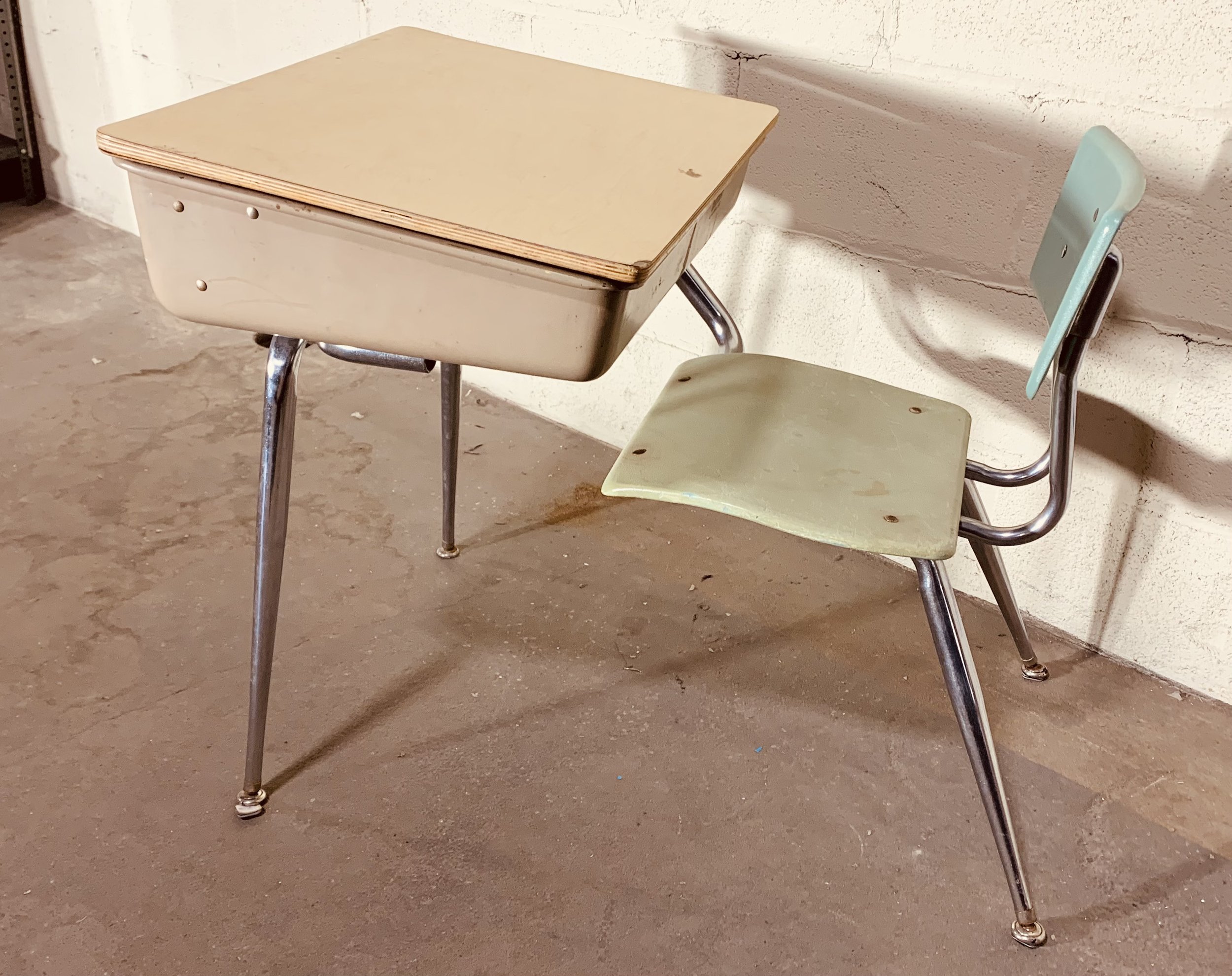 school desk on concrete floor