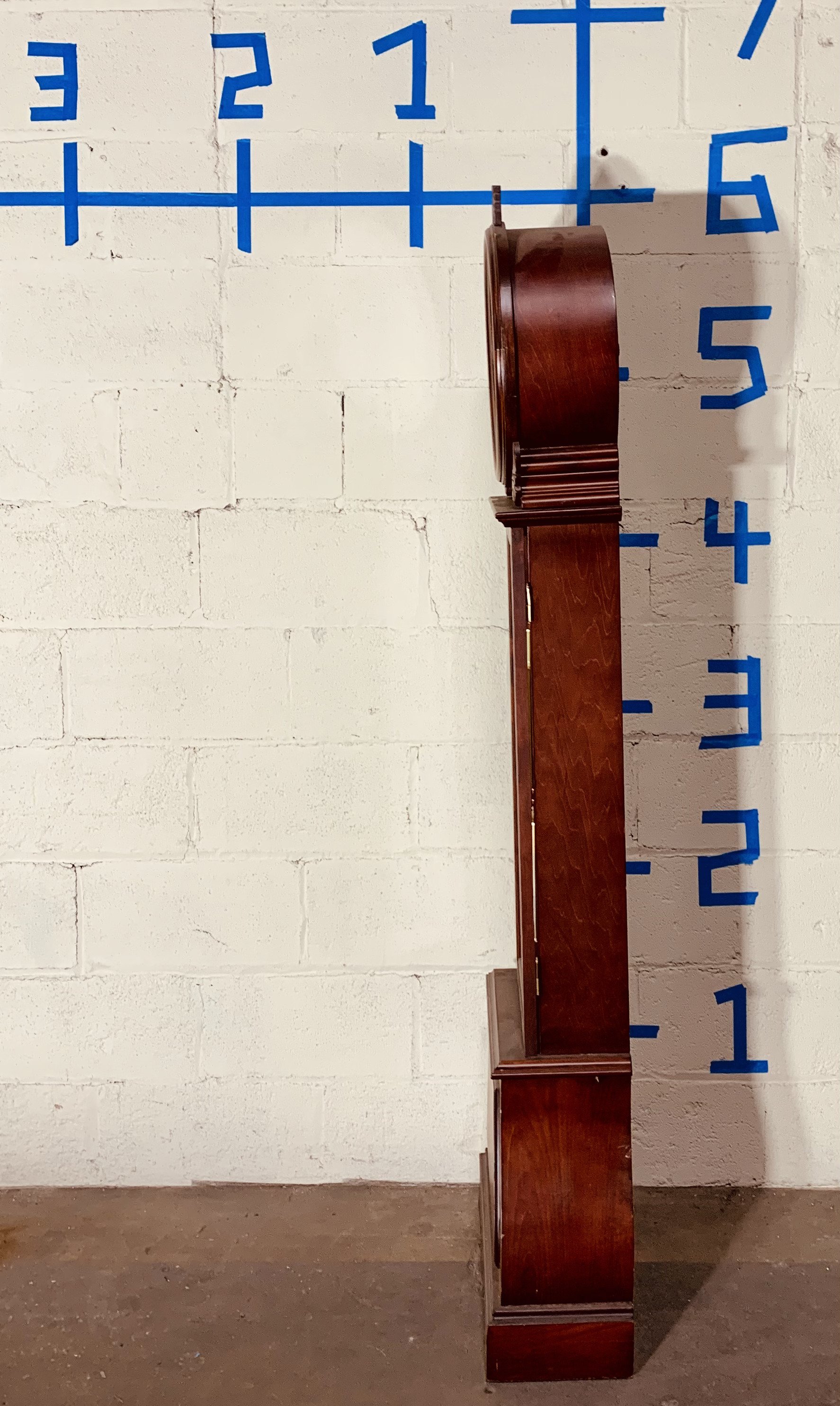 side view grandmother clock against wall with dimensions